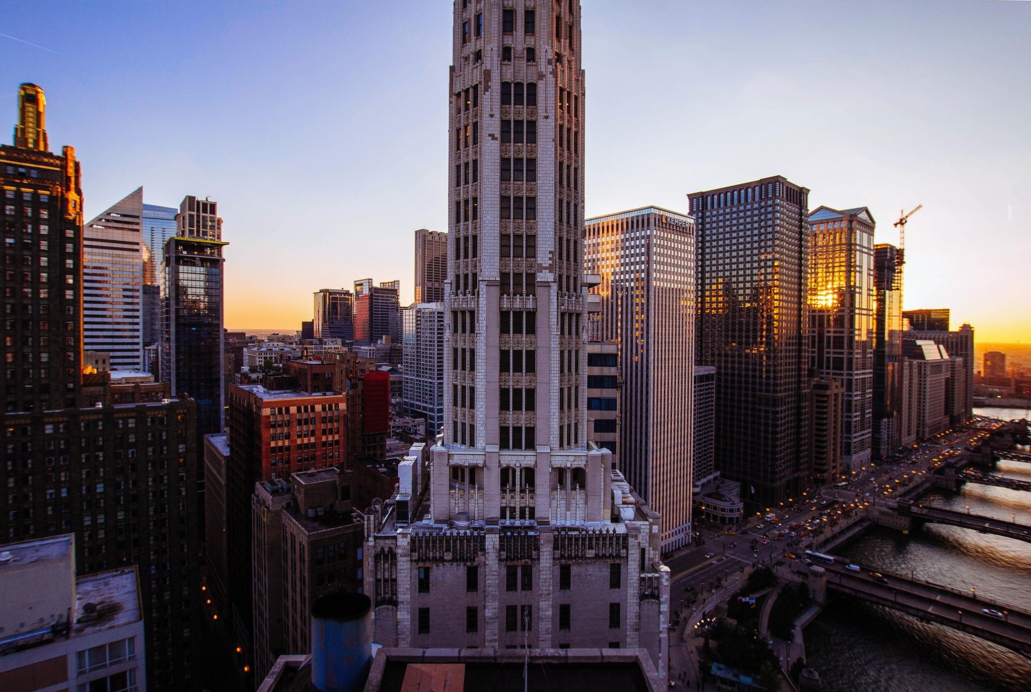 Chicago cityscape at sunset with skyscrapers and river HD Wallpaper
