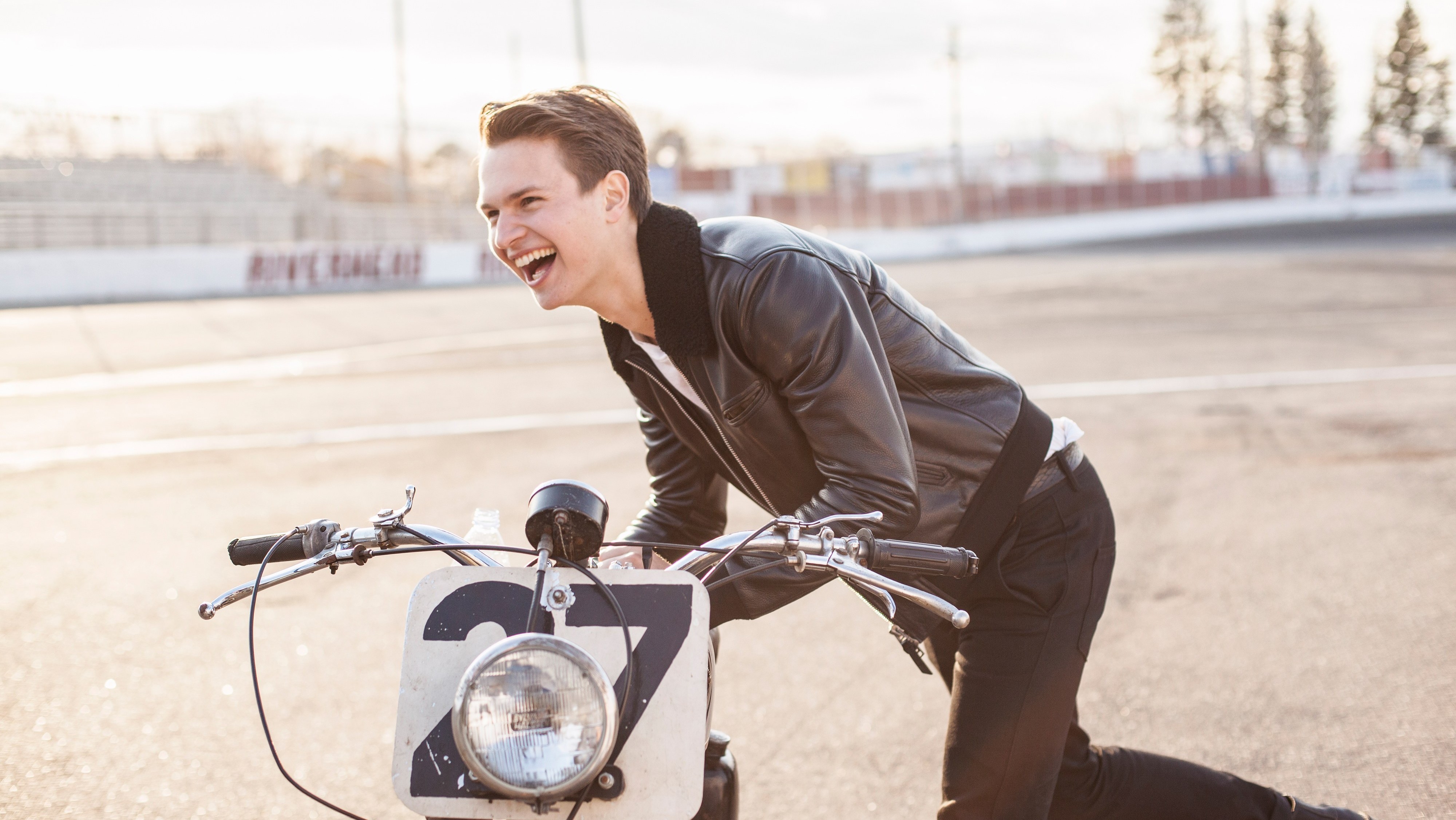 Ansel Elgort on a motorcycle HD Wallpaper