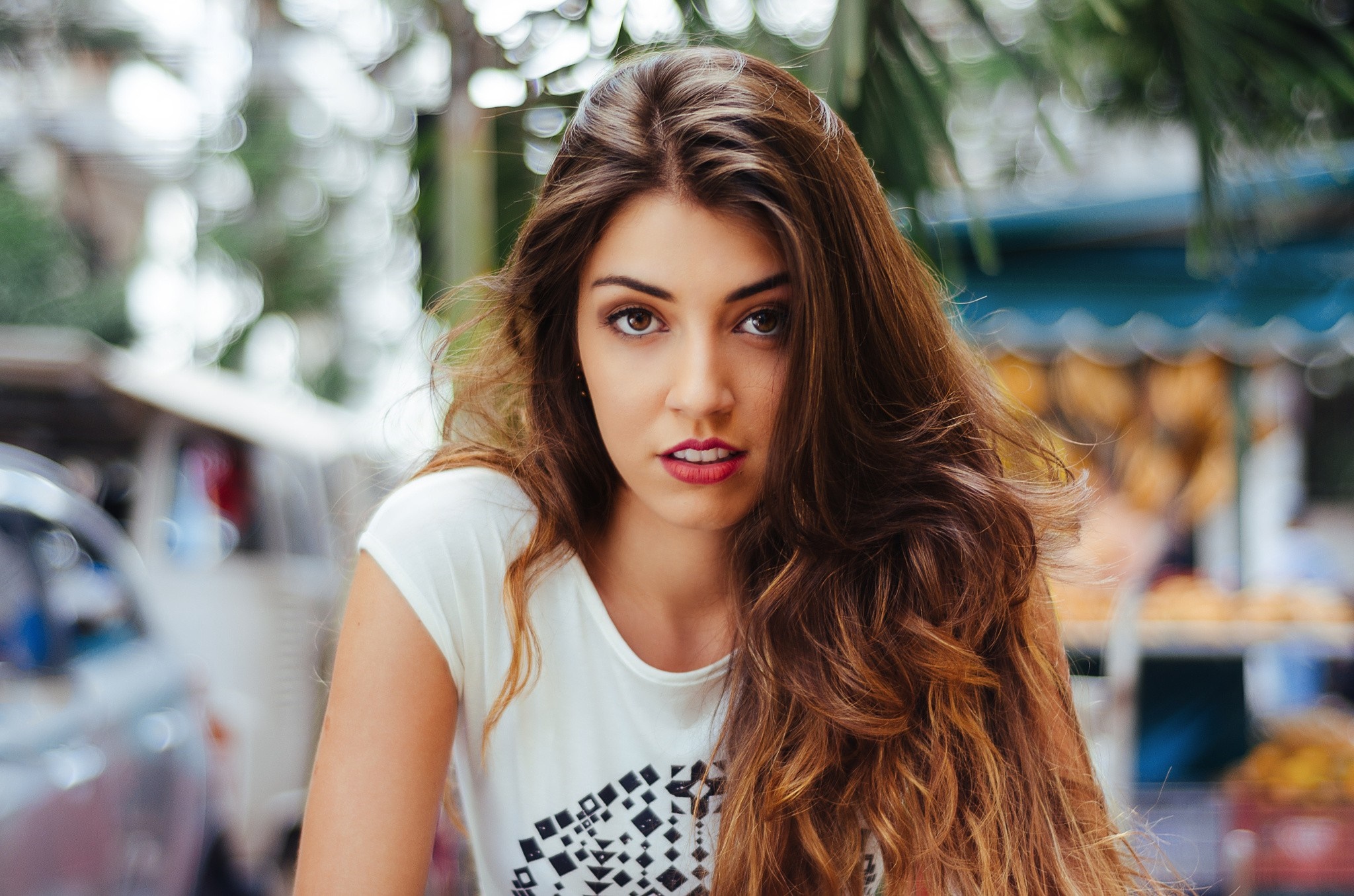 Woman with long brown hair wearing a white shirt HD Wallpaper
