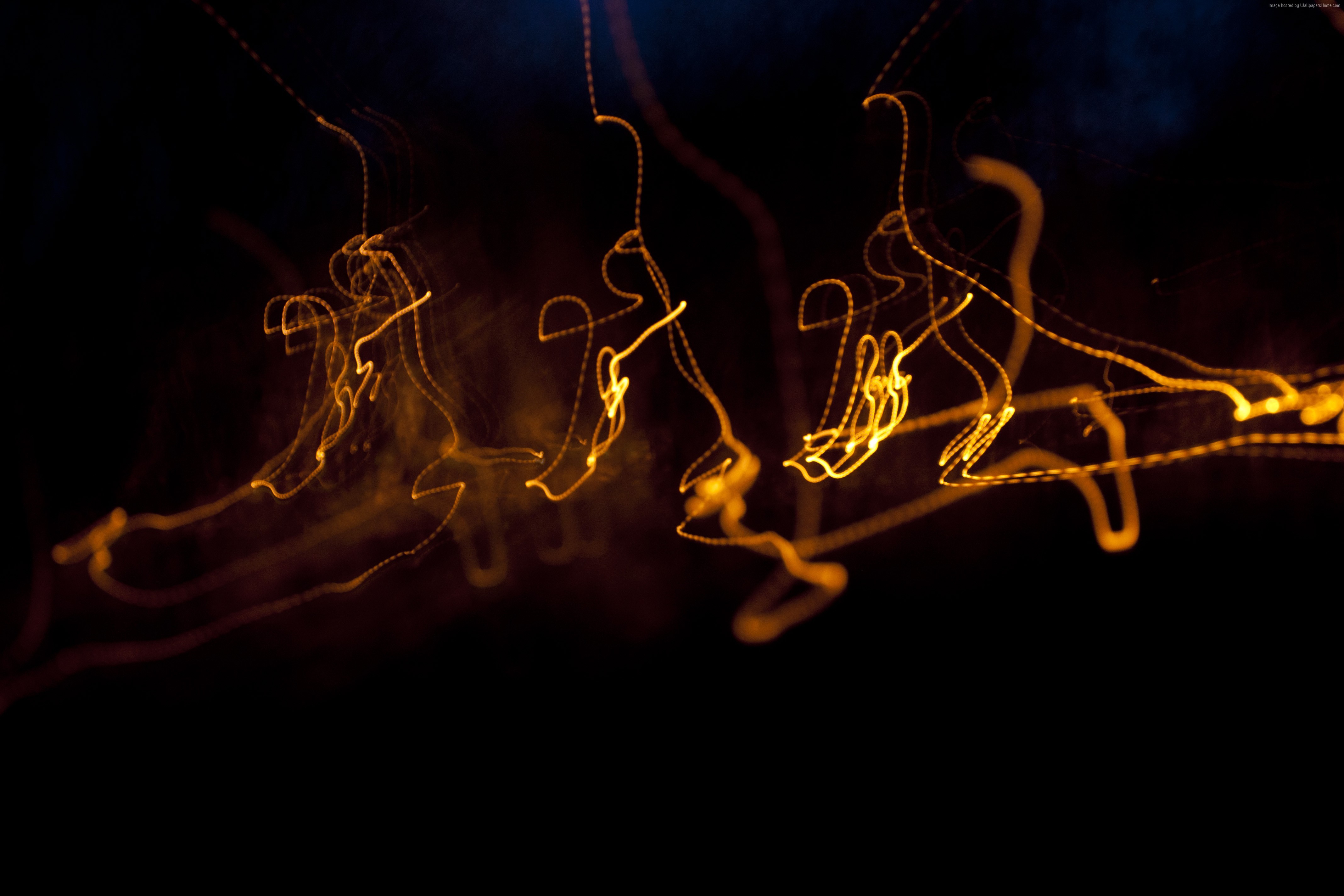 Yellow light trails on black background HD Wallpaper
