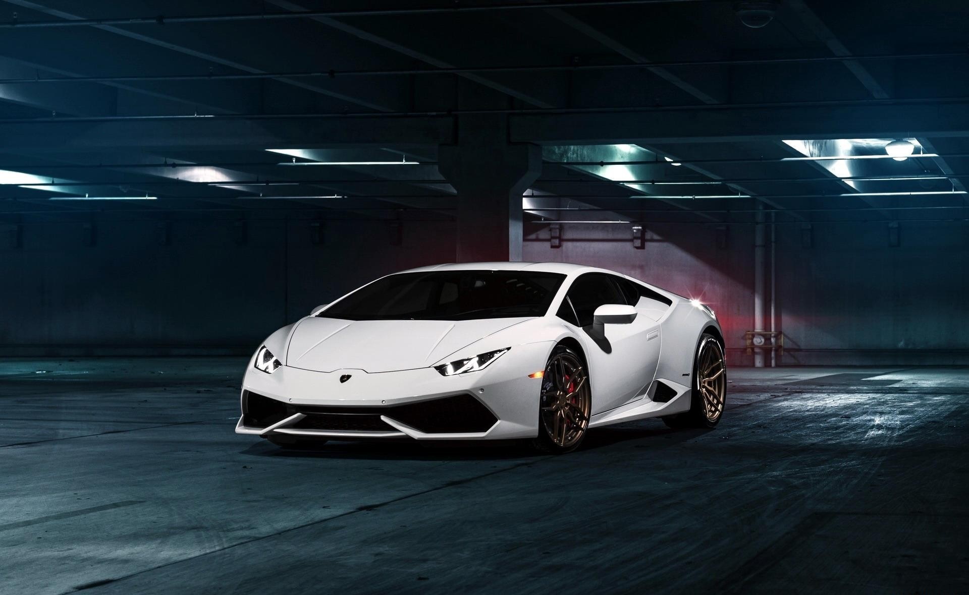 White Lamborghini Huracan parked in a dark garage HD Wallpaper