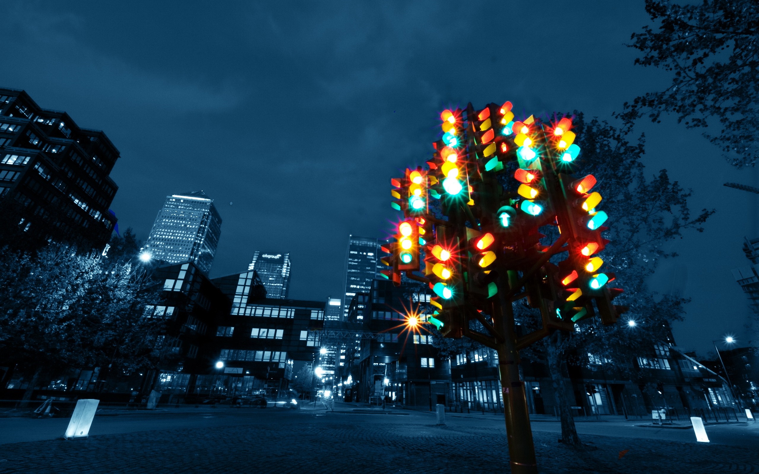 Colorful traffic lights tree in a city at night HD Wallpaper