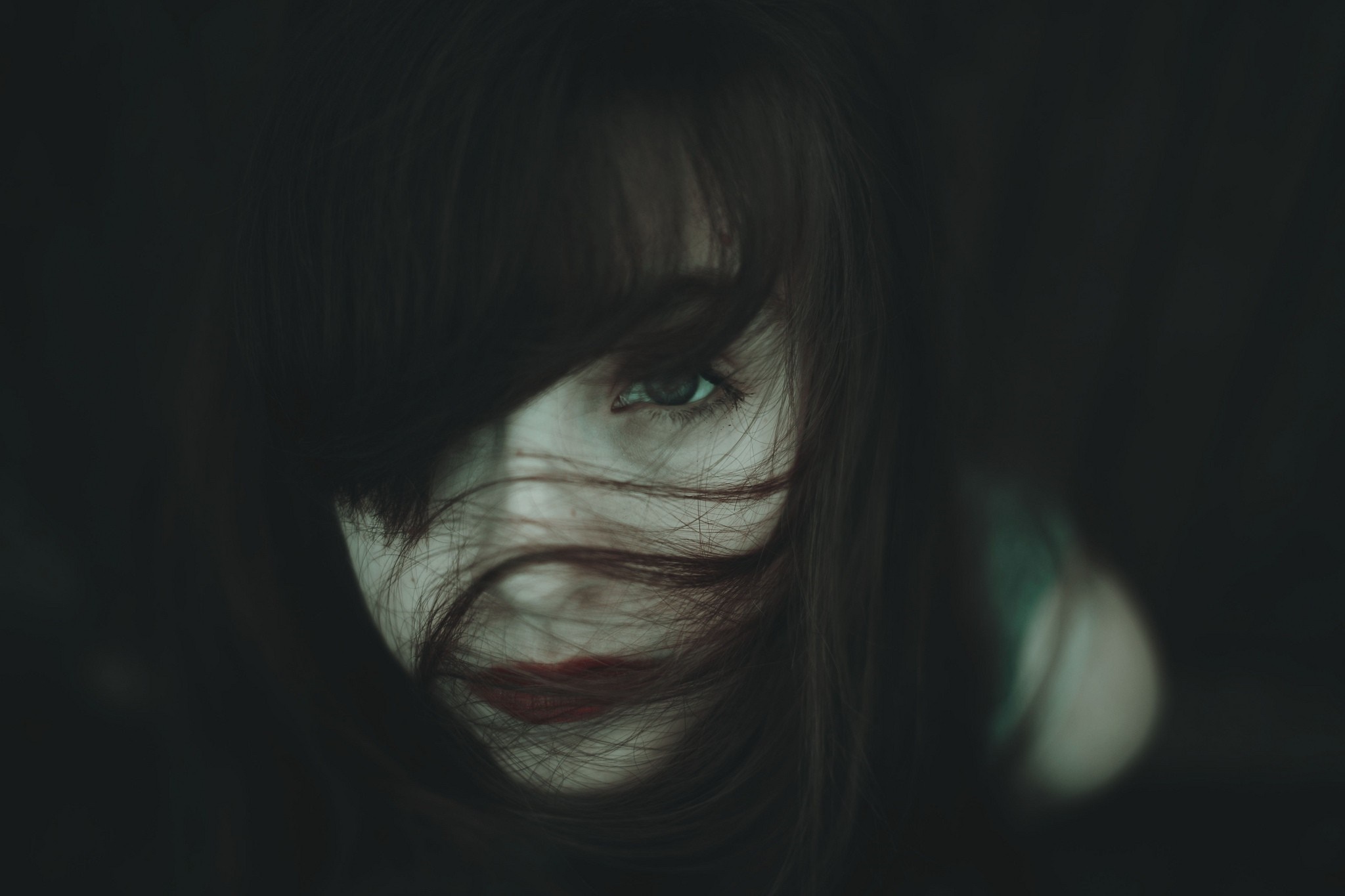 Woman with hair in face and red lipstick HD Wallpaper