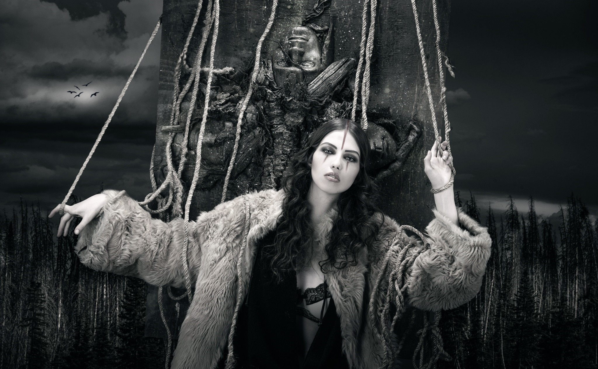 Woman in fur coat manipulated by strings HD Wallpaper