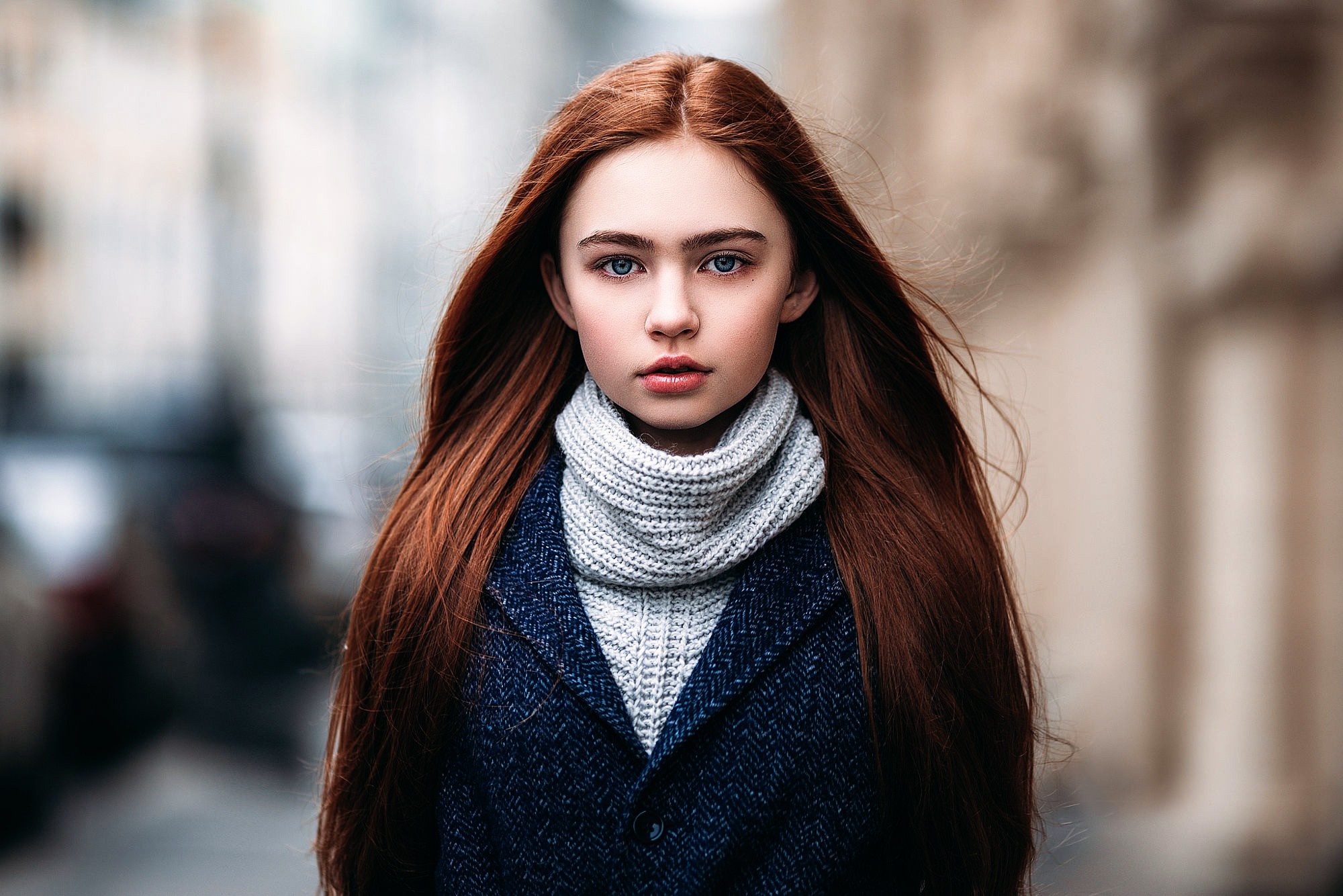 Young woman with long red hair wearing a coat and scarf HD Wallpaper