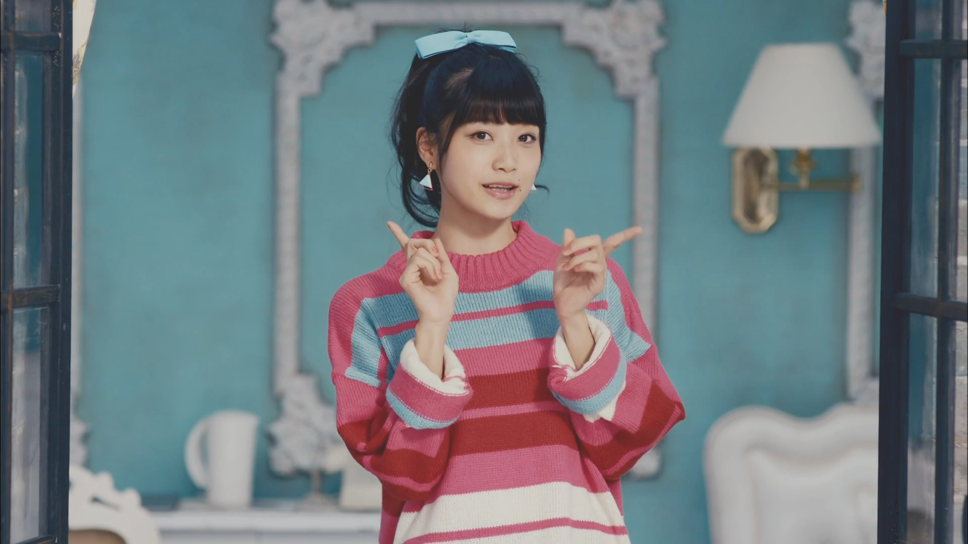 Asian woman with blue bow in hair wearing striped sweater HD Wallpaper