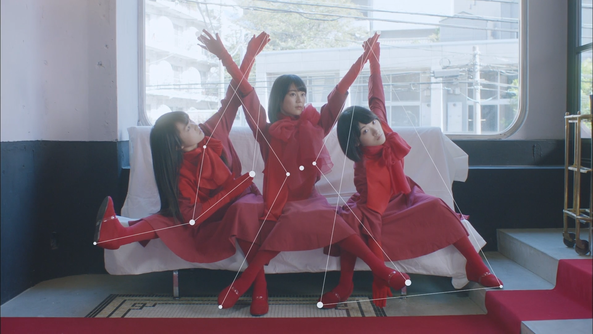 Three women in red outfits performing art HD Wallpaper