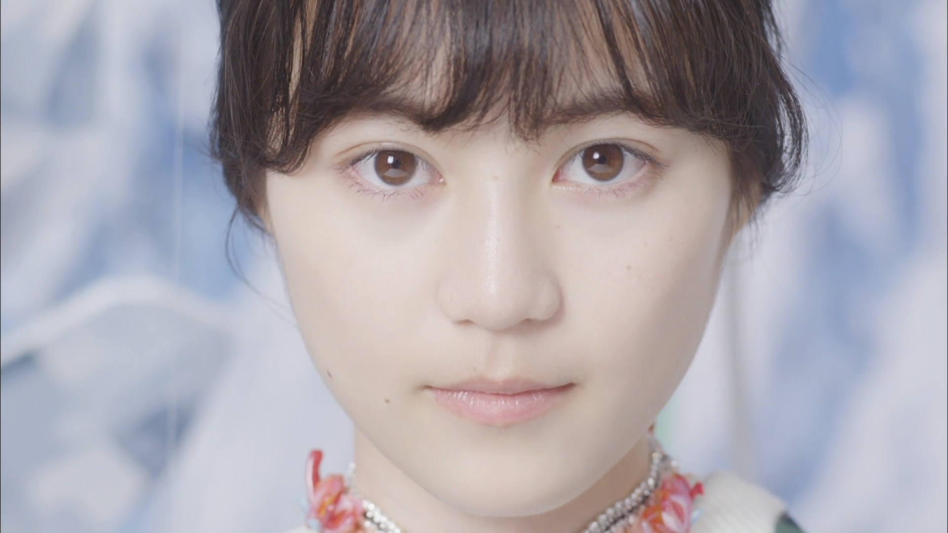 Close-up portrait of a young Asian woman with brown eyes HD Wallpaper
