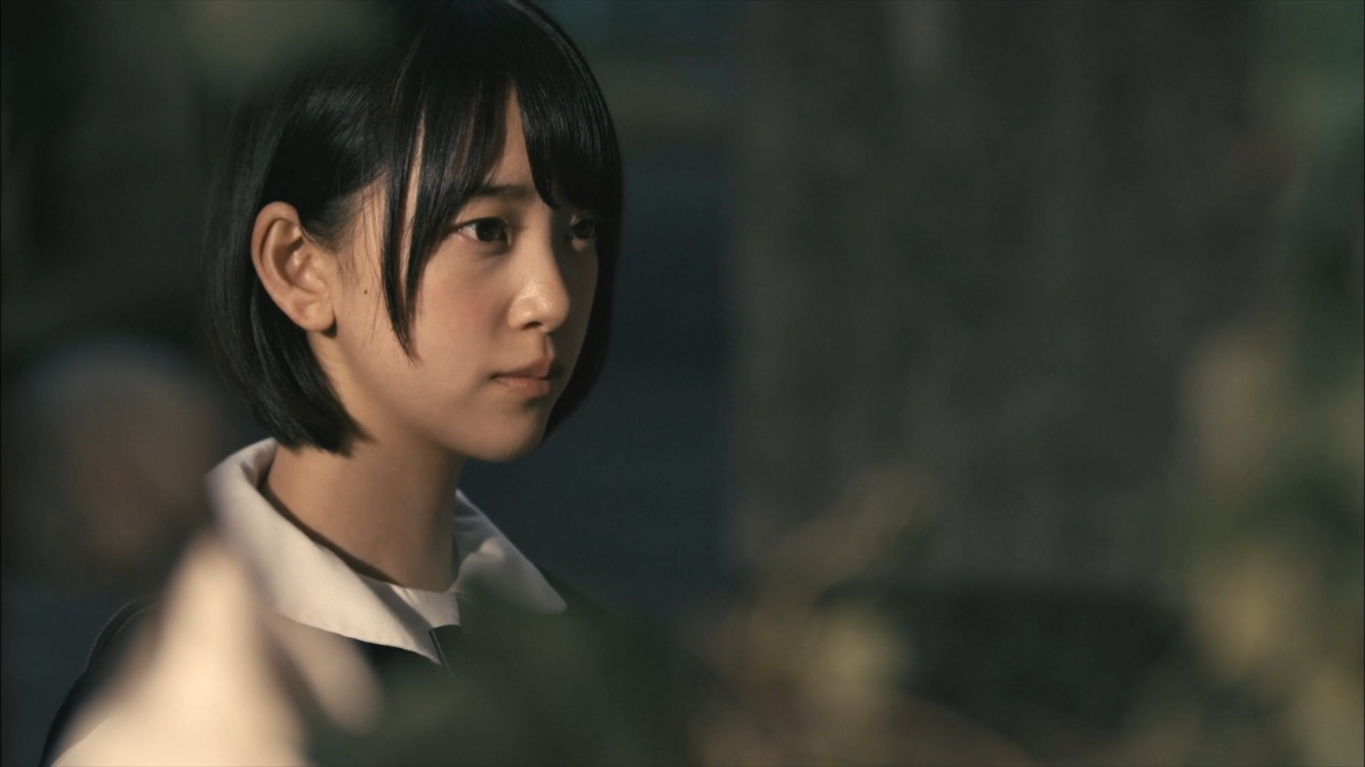 Asian woman with short black hair looking away HD Wallpaper