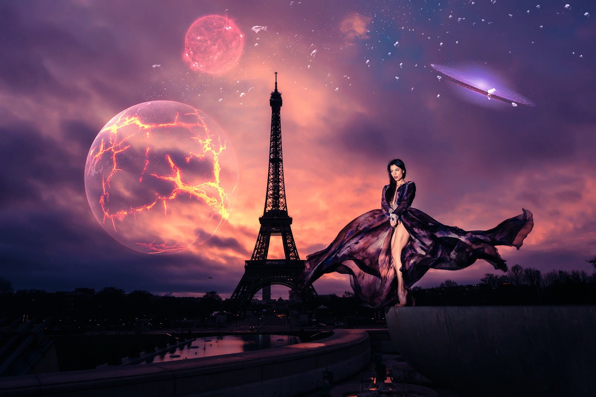 Woman in flowing dress in front of Eiffel Tower with alien planets HD Wallpaper