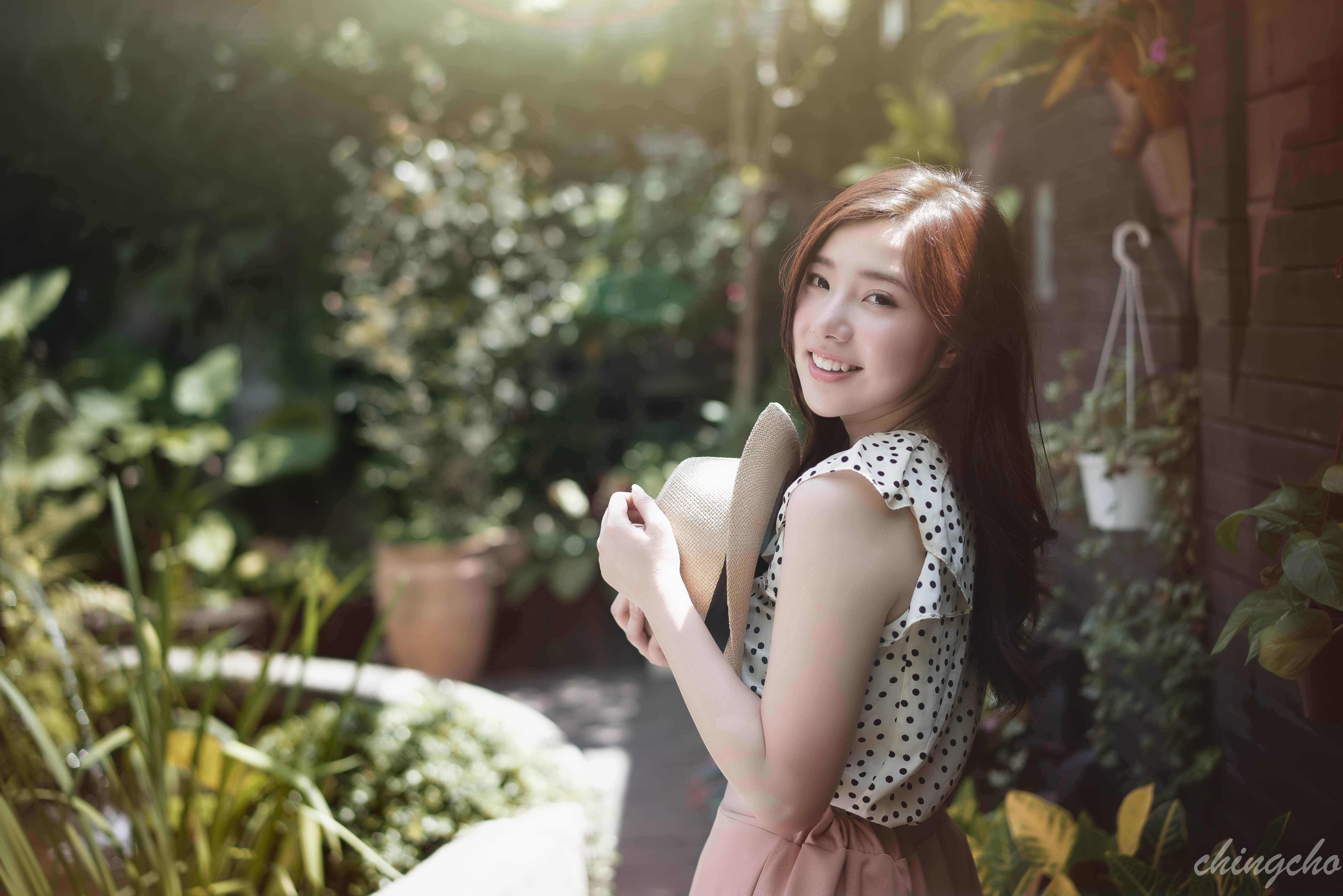 Taiwanese Woman in Polka Dot Dress Holding Hat HD Wallpaper