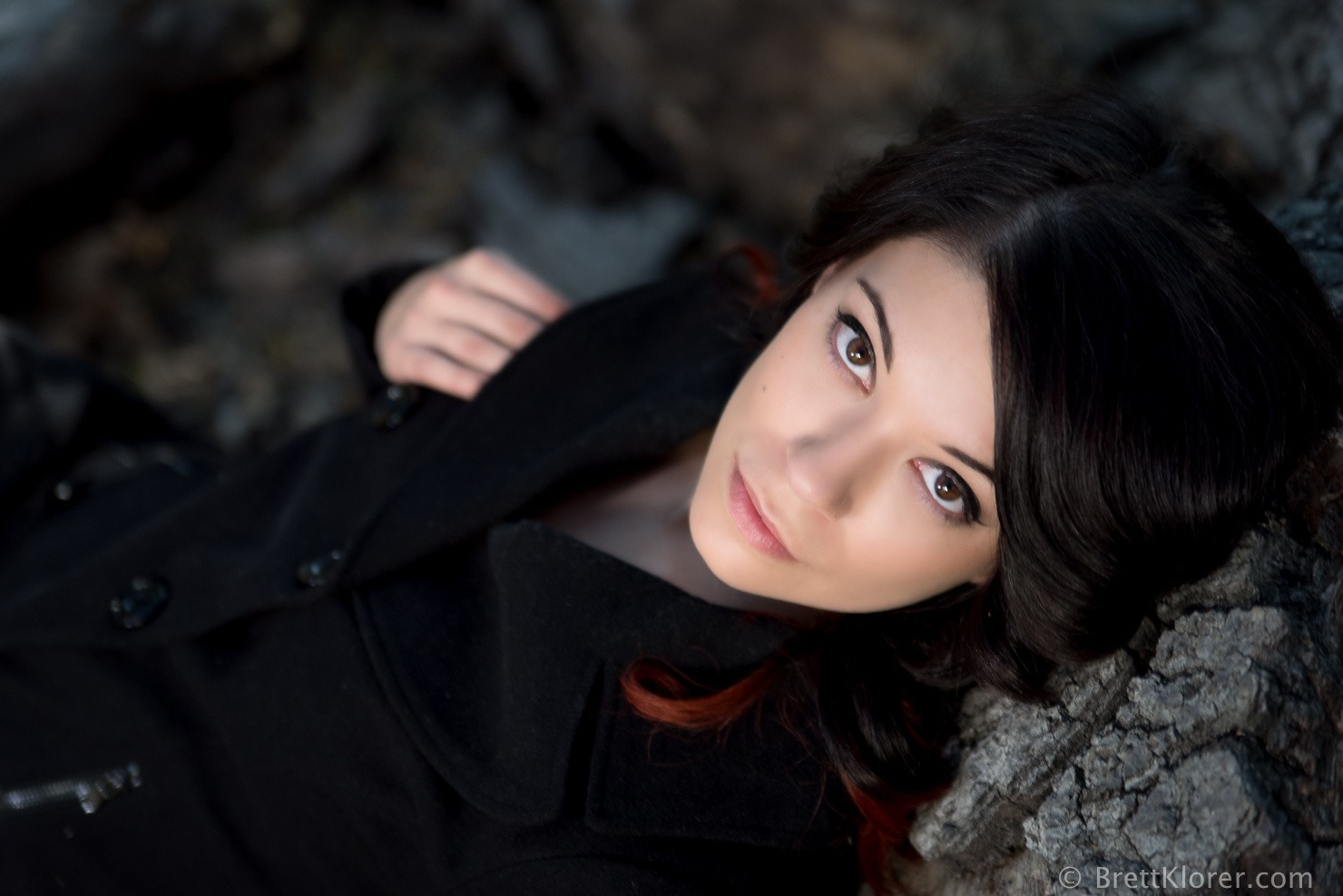 Woman with black hair and brown eyes wearing a black coat HD Wallpaper