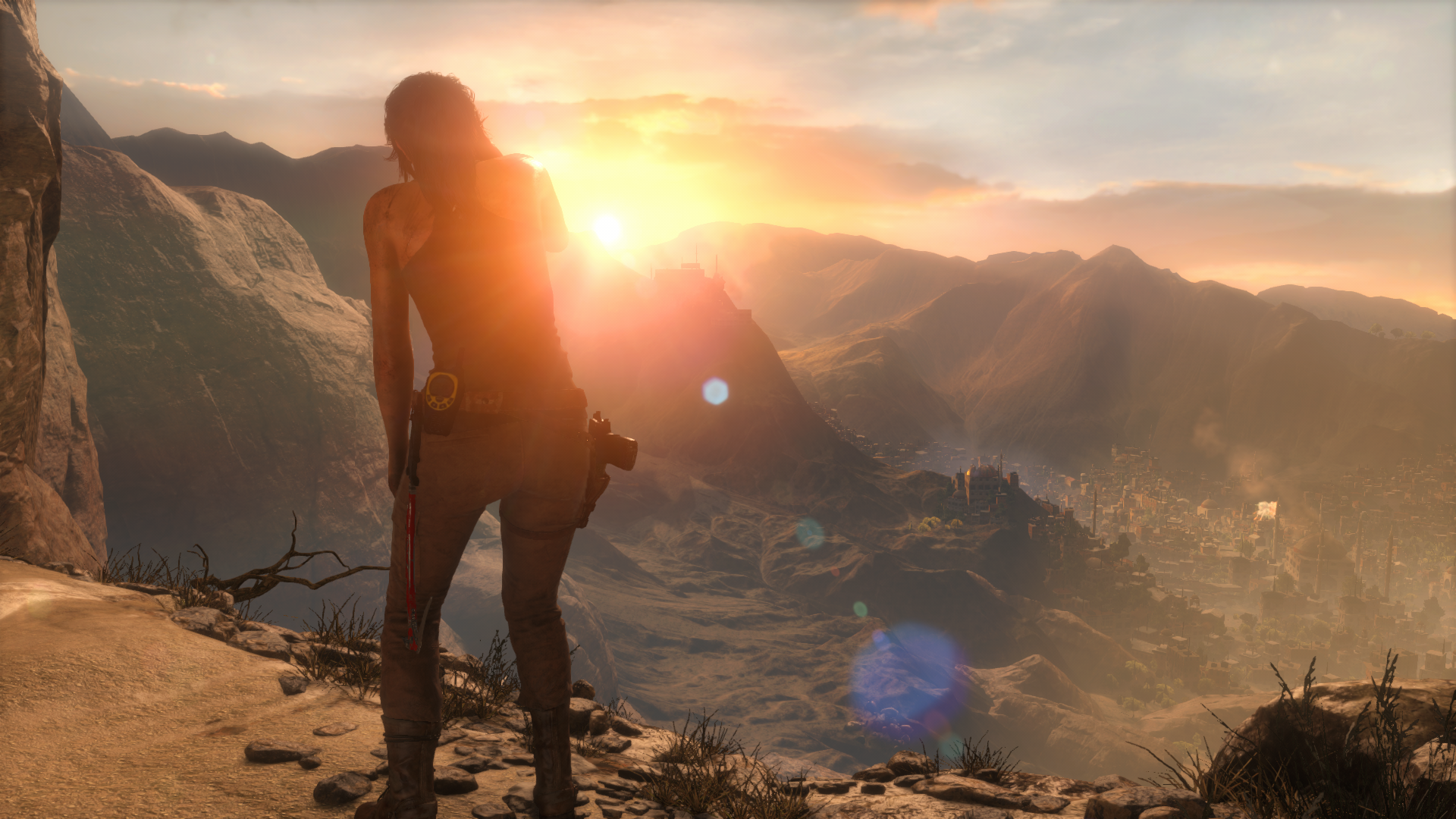 Lara Croft from Rise of the Tomb Raider overlooking a valley at sunset HD Wallpaper