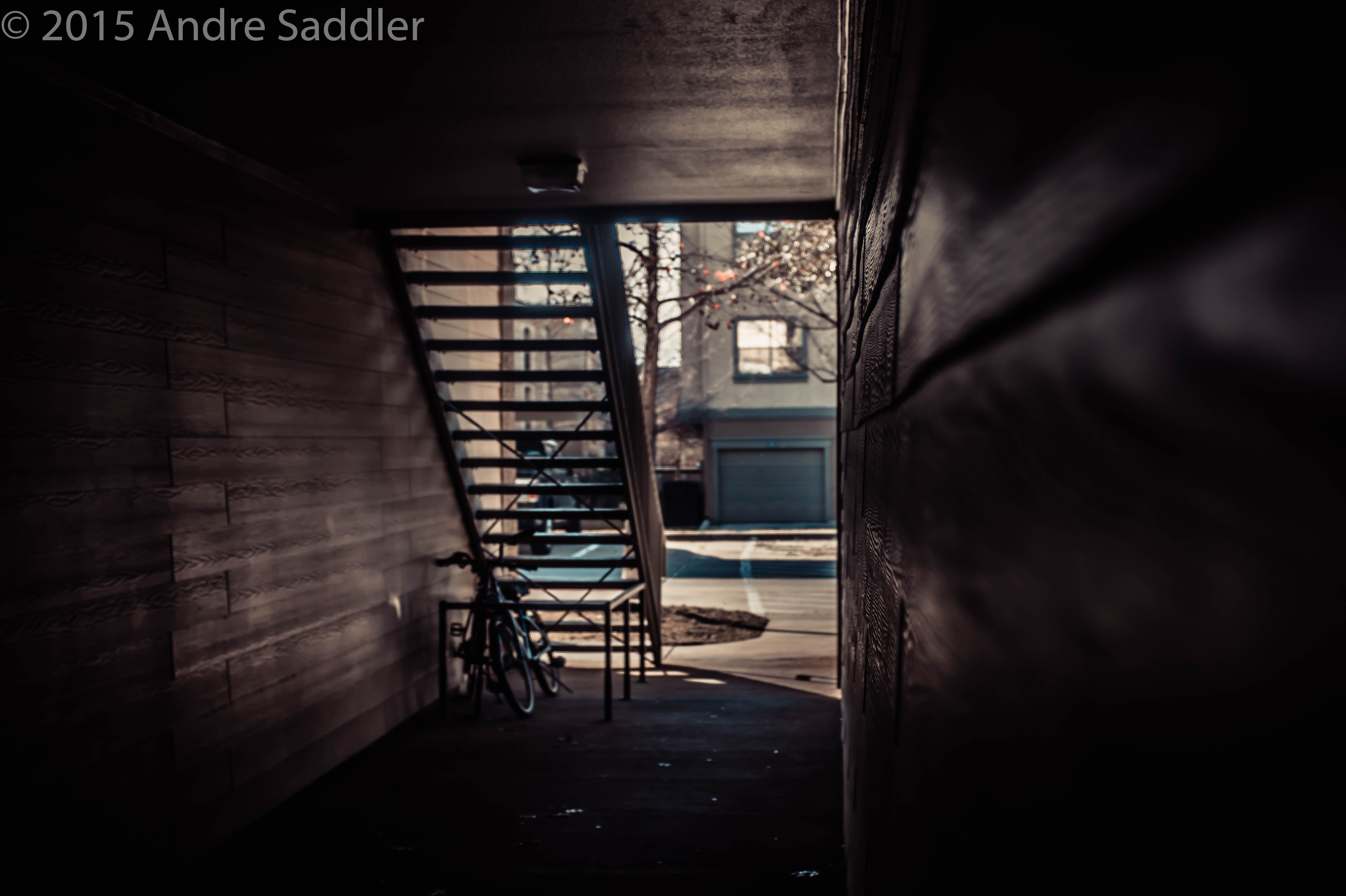 Bicycles by outdoor stairs with building in background HD Wallpaper