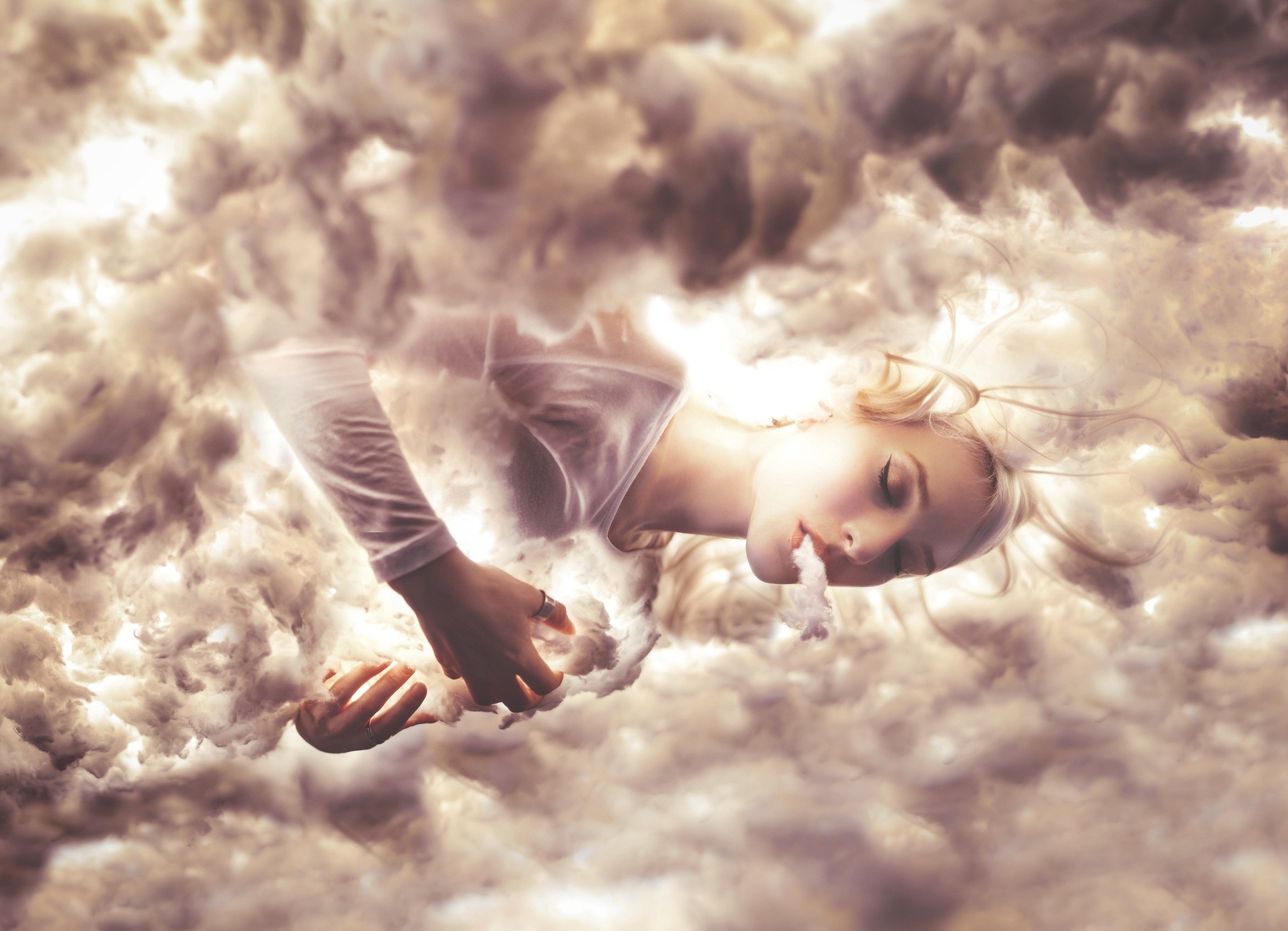 Woman floating in clouds with sunlight HD Wallpaper