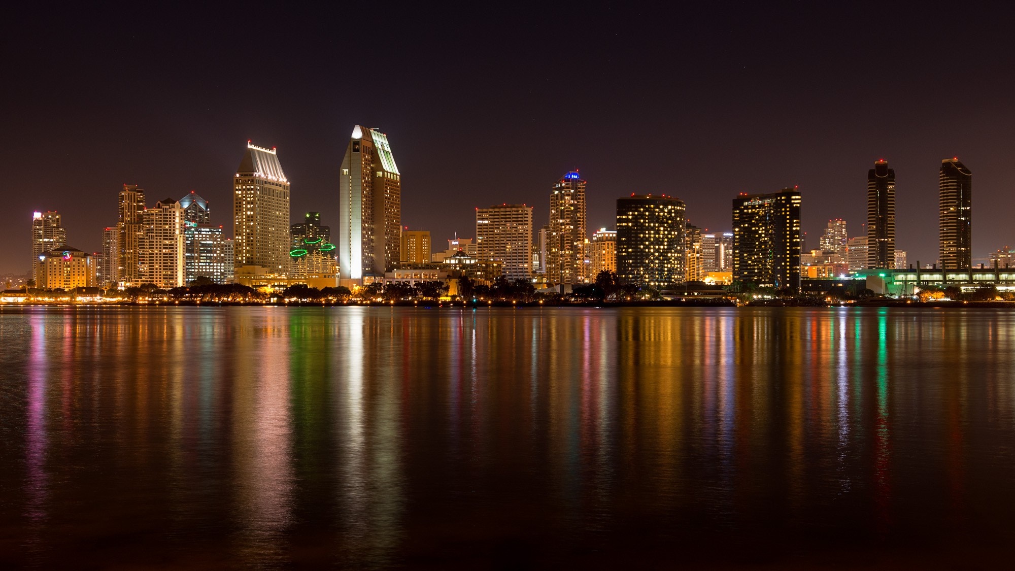 San Diego skyline at night with water reflections HD Wallpaper