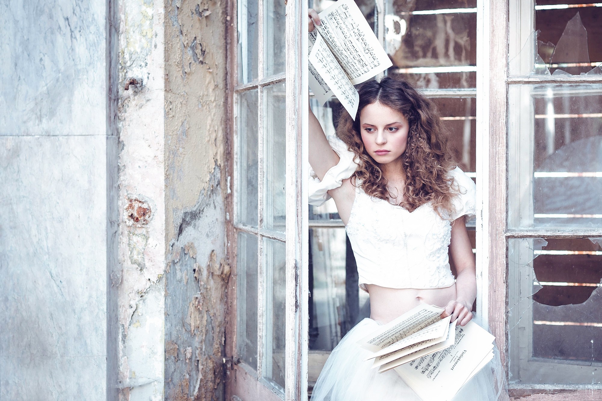 Woman in white dress holding musical notes HD Wallpaper
