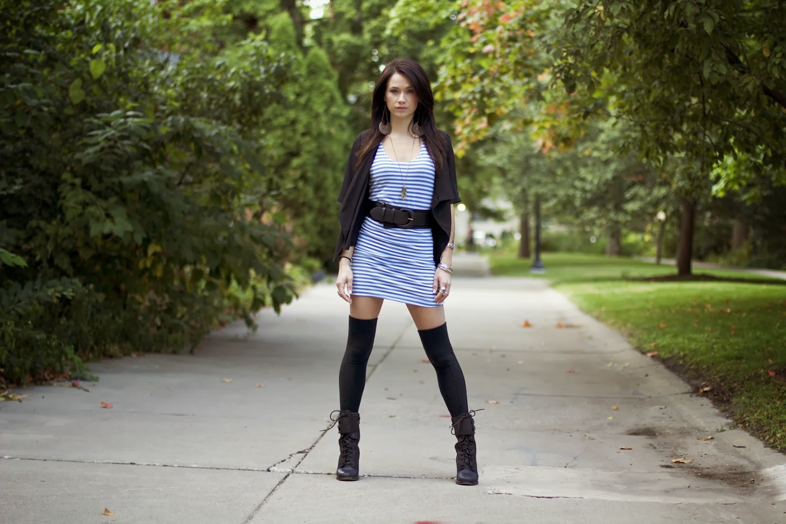 Woman in striped dress and knee-high socks in park HD Wallpaper