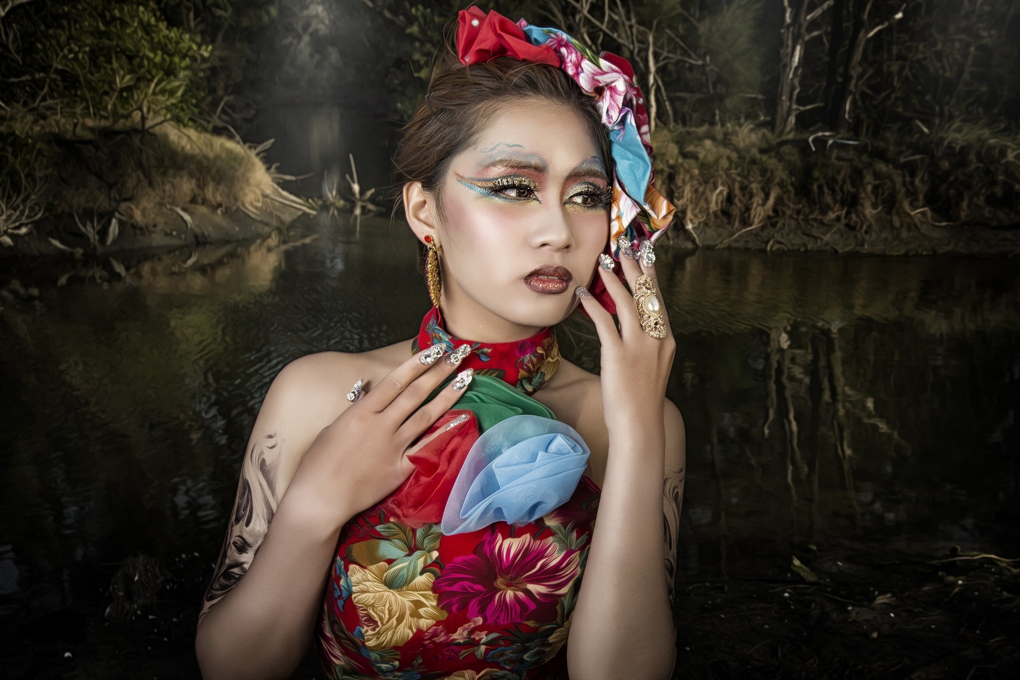 Woman with elaborate makeup and floral dress in water HD Wallpaper