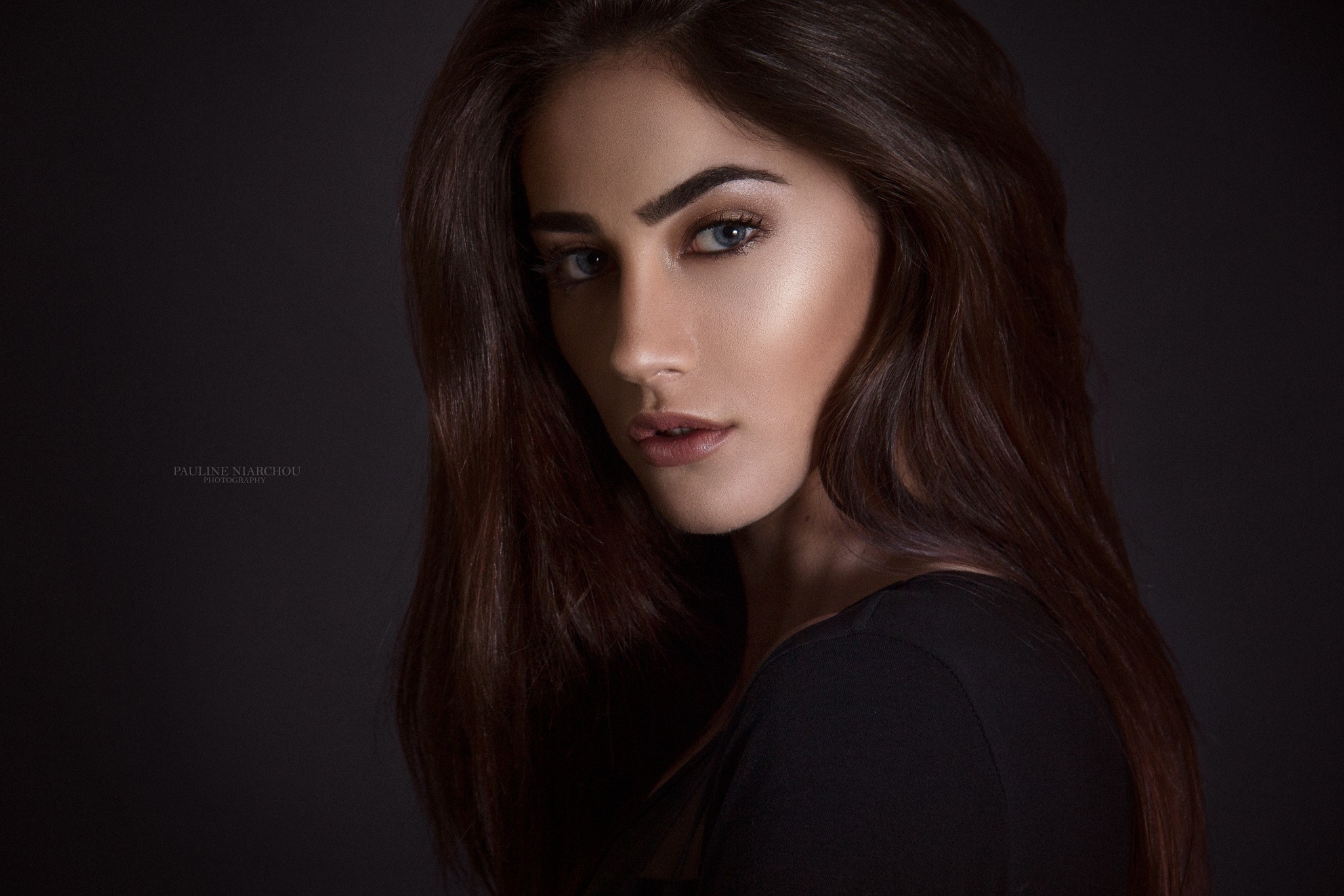 Woman with long brown hair and blue eyes HD Wallpaper