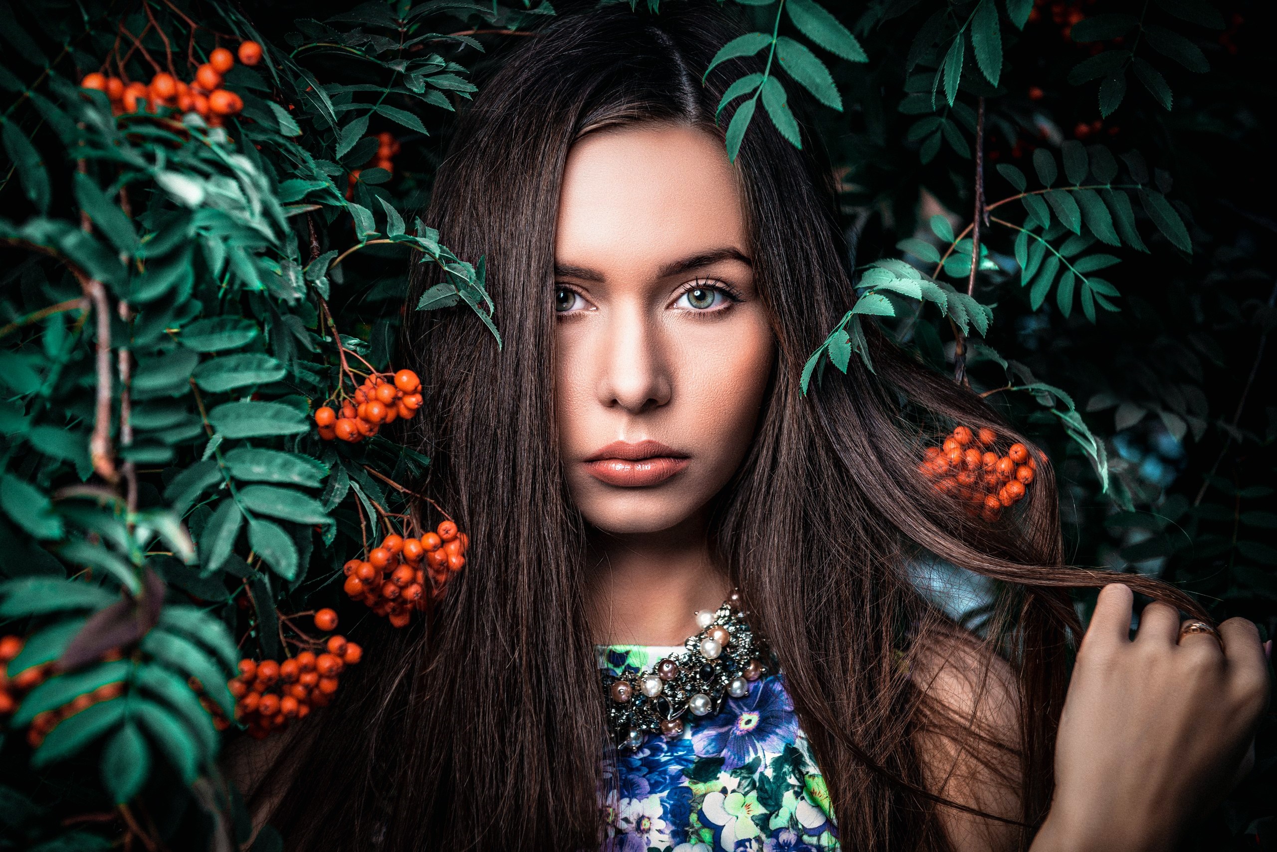 Woman with dark hair and flowers HD Wallpaper
