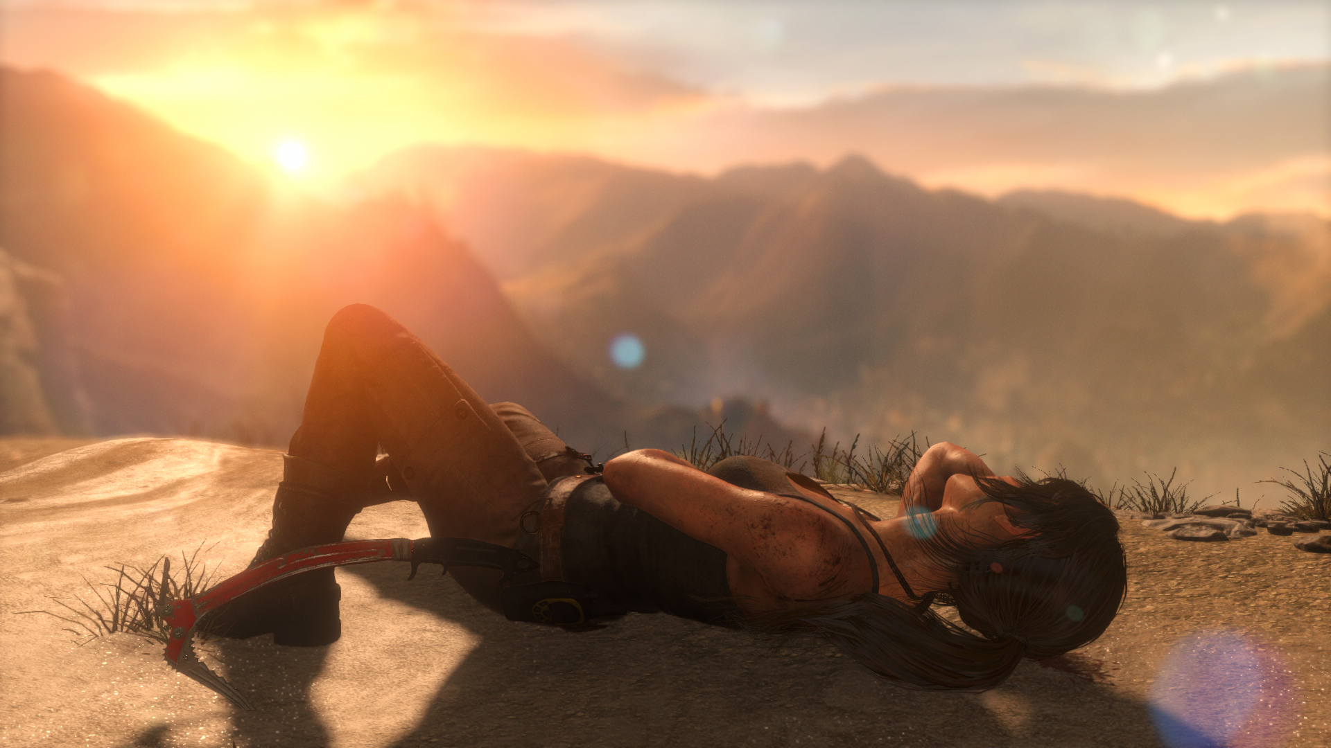 Lara Croft from Tomb Raider lying down at sunrise HD Wallpaper