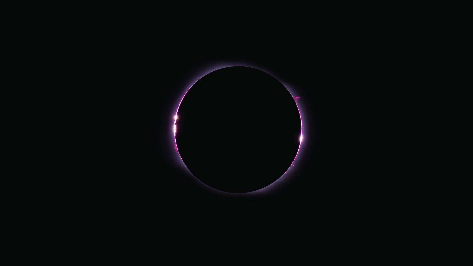 Solar eclipse with pink corona HD Wallpaper