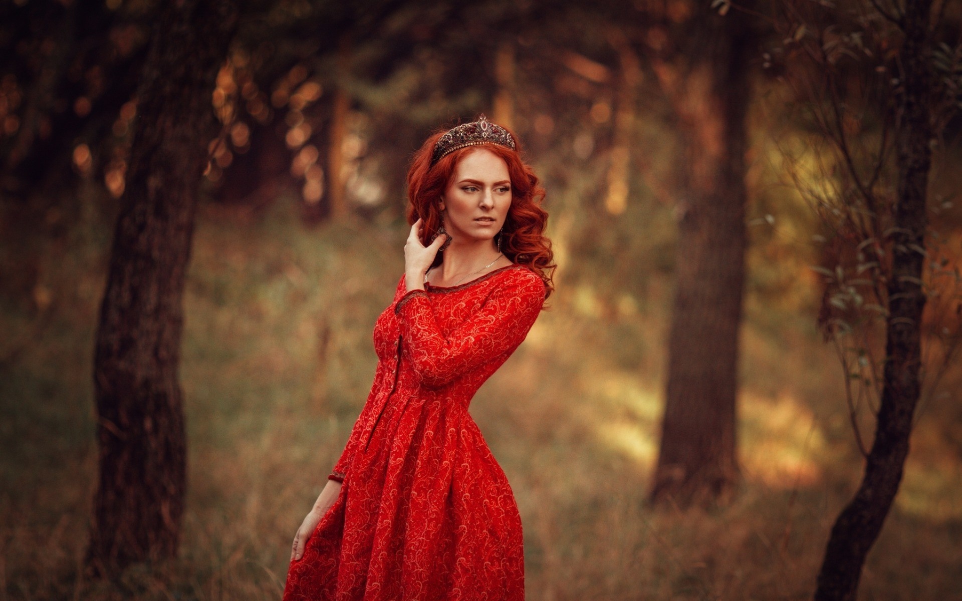 Redhead woman in red dress with crown in forest HD Wallpaper