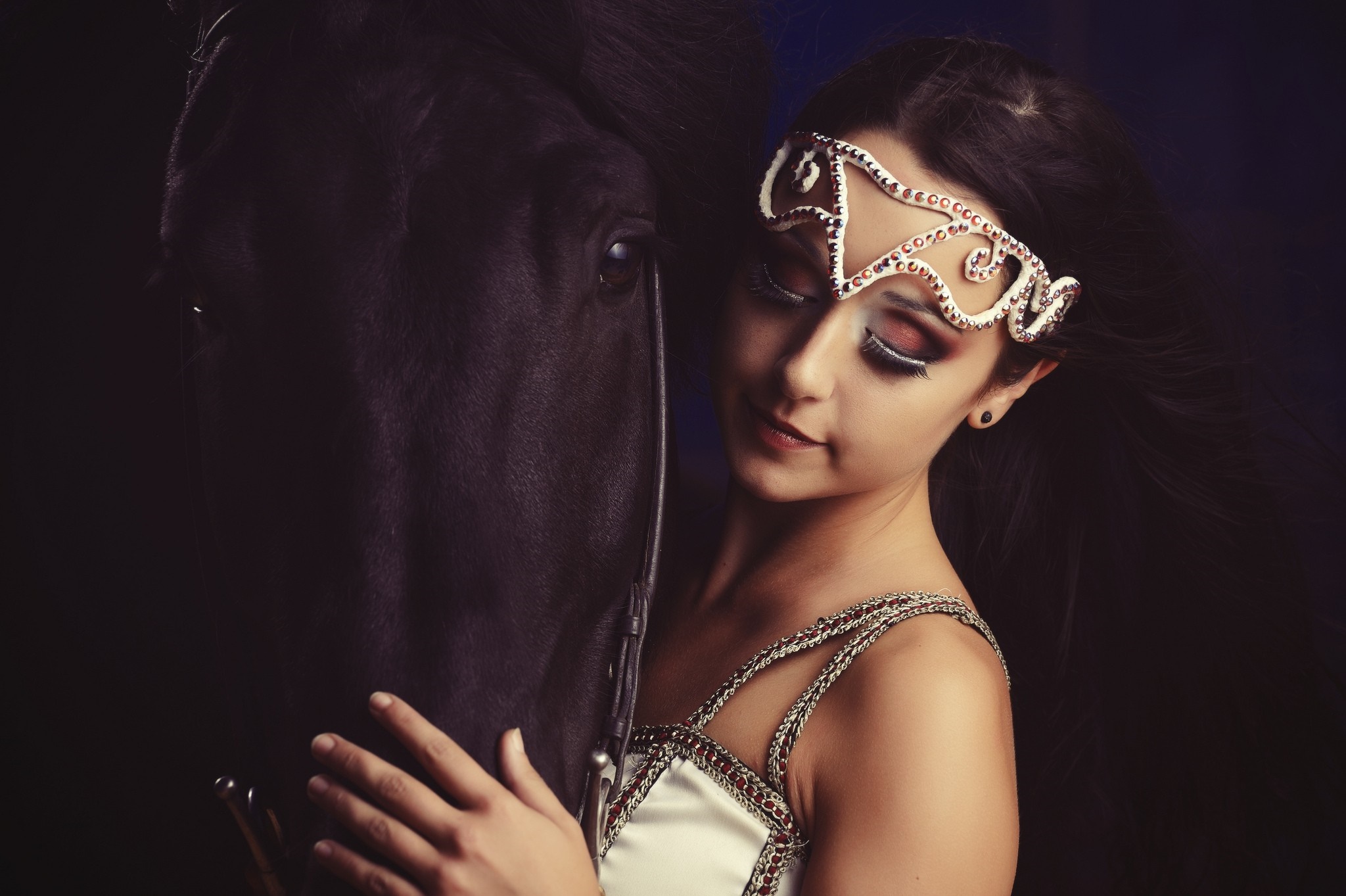 Woman with a black horse and ornate headpiece HD Wallpaper