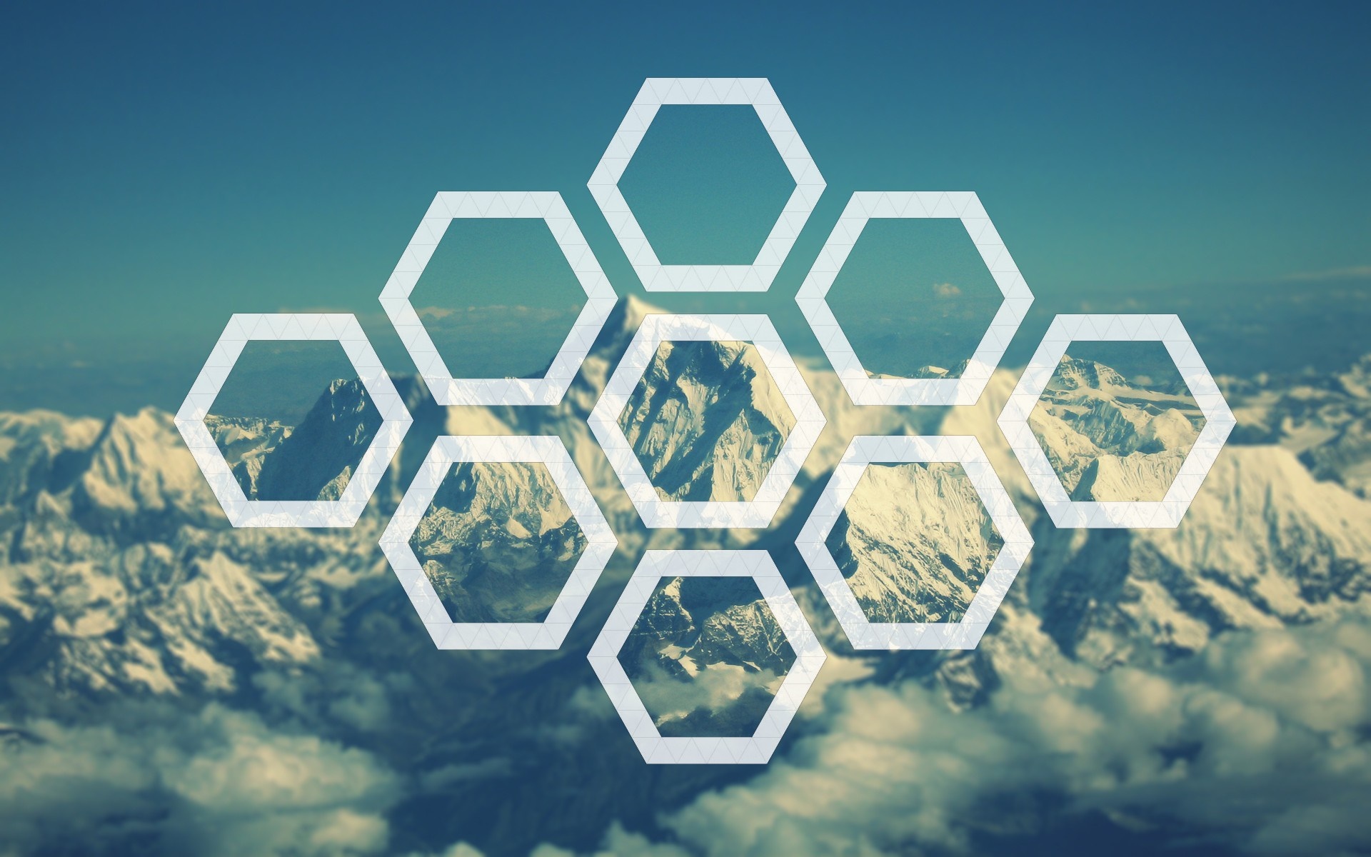 Hexagons overlaying a mountain range HD Wallpaper