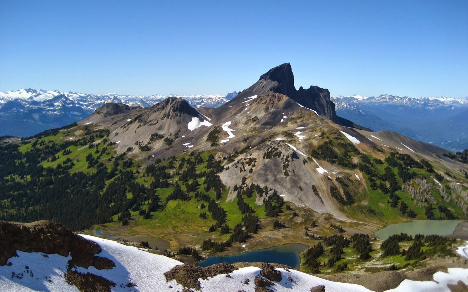 Mountain landscape with lakes and snow-capped peaks HD Wallpaper