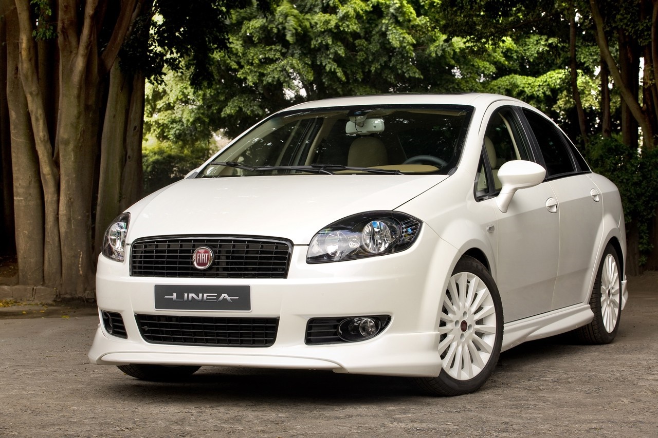White Fiat Linea Sedan parked outdoors HD Wallpaper