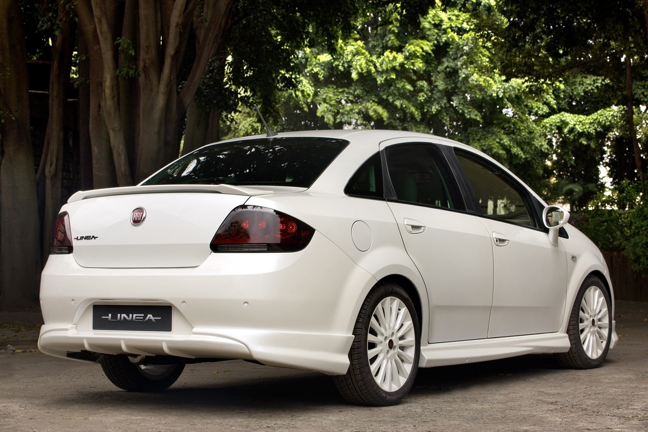 White Fiat Linea sedan parked outdoors HD Wallpaper
