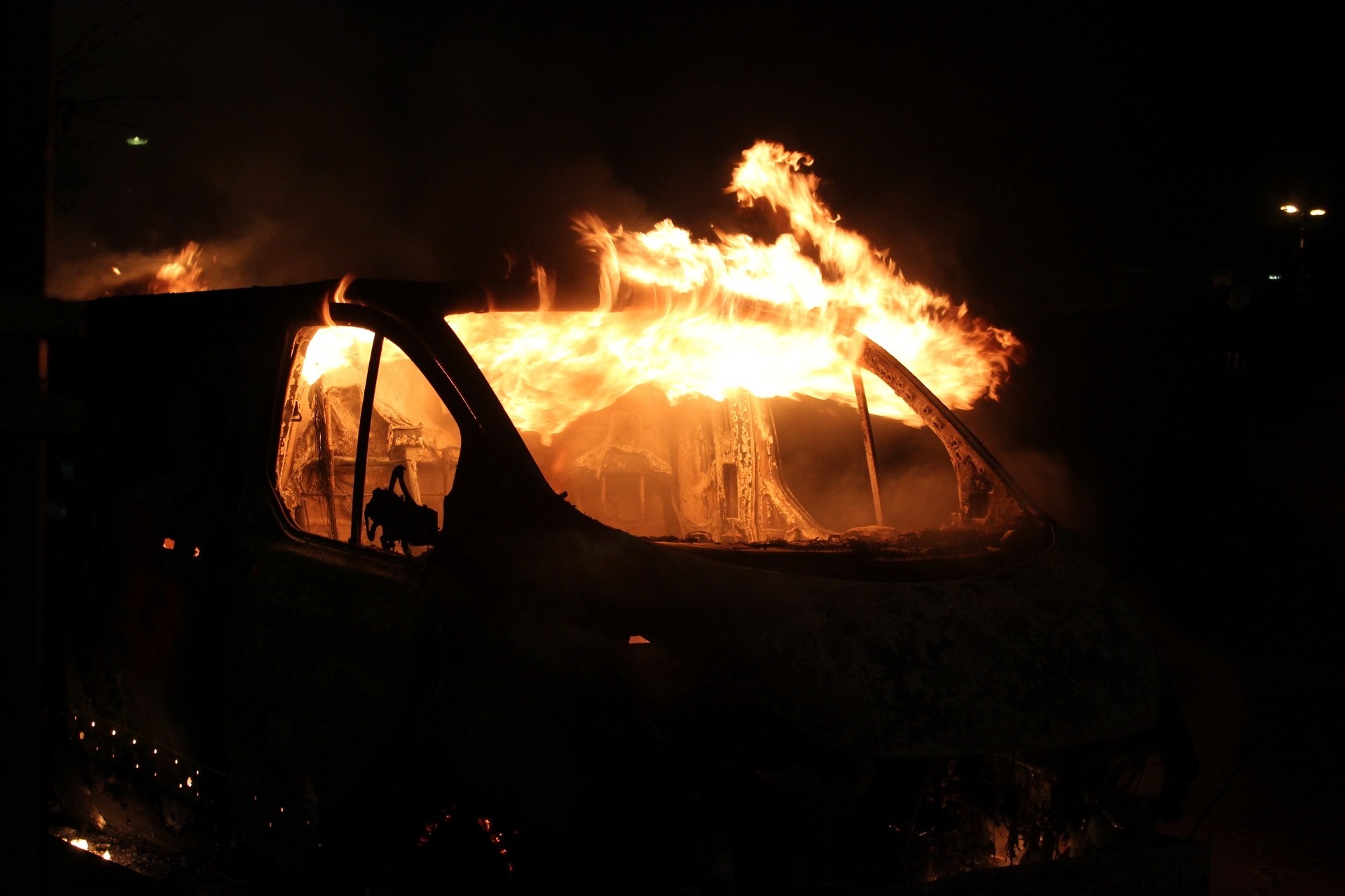 Car on fire at night HD Wallpaper
