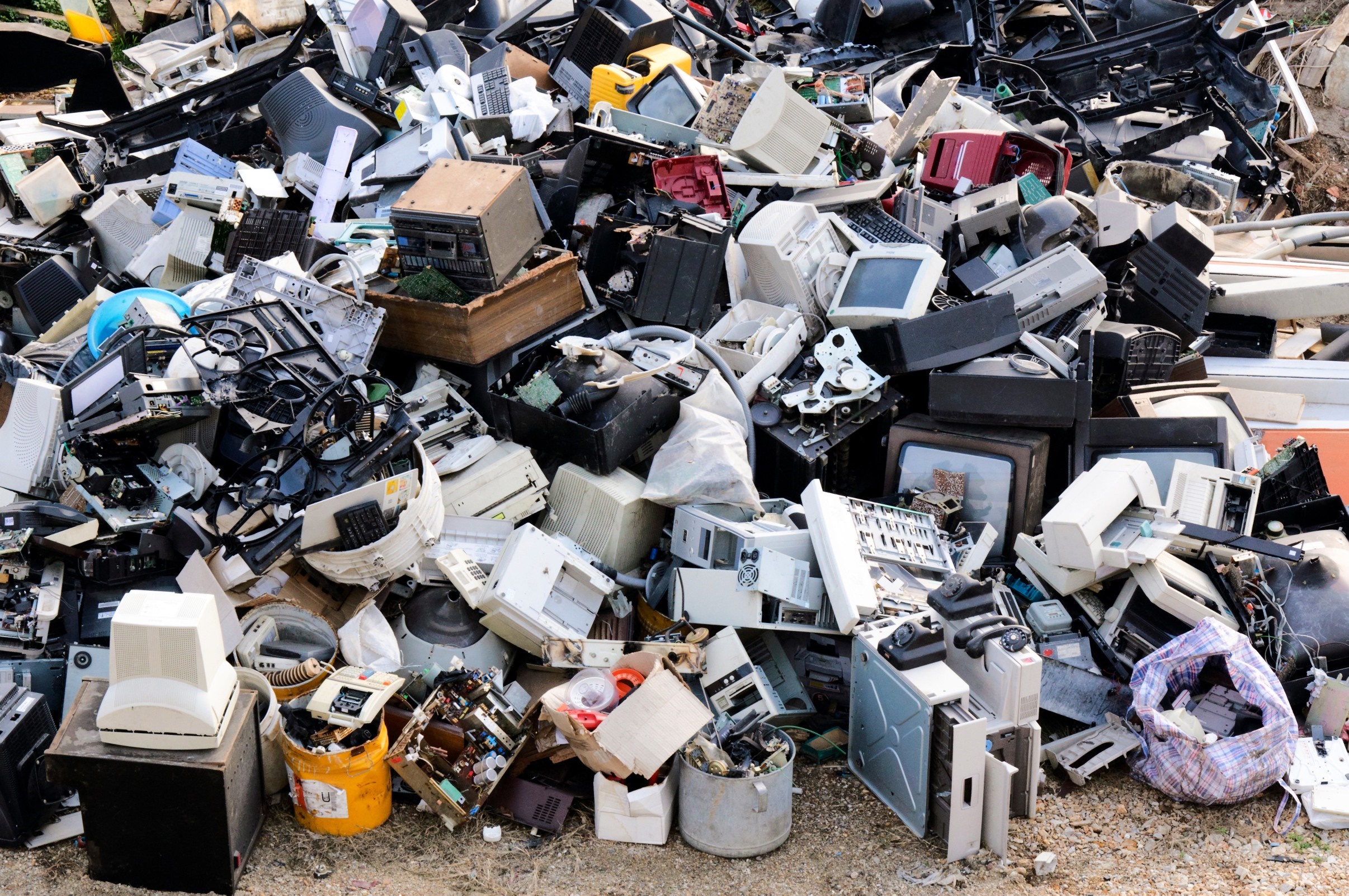 Pile of discarded electronic waste and computer equipment HD Wallpaper