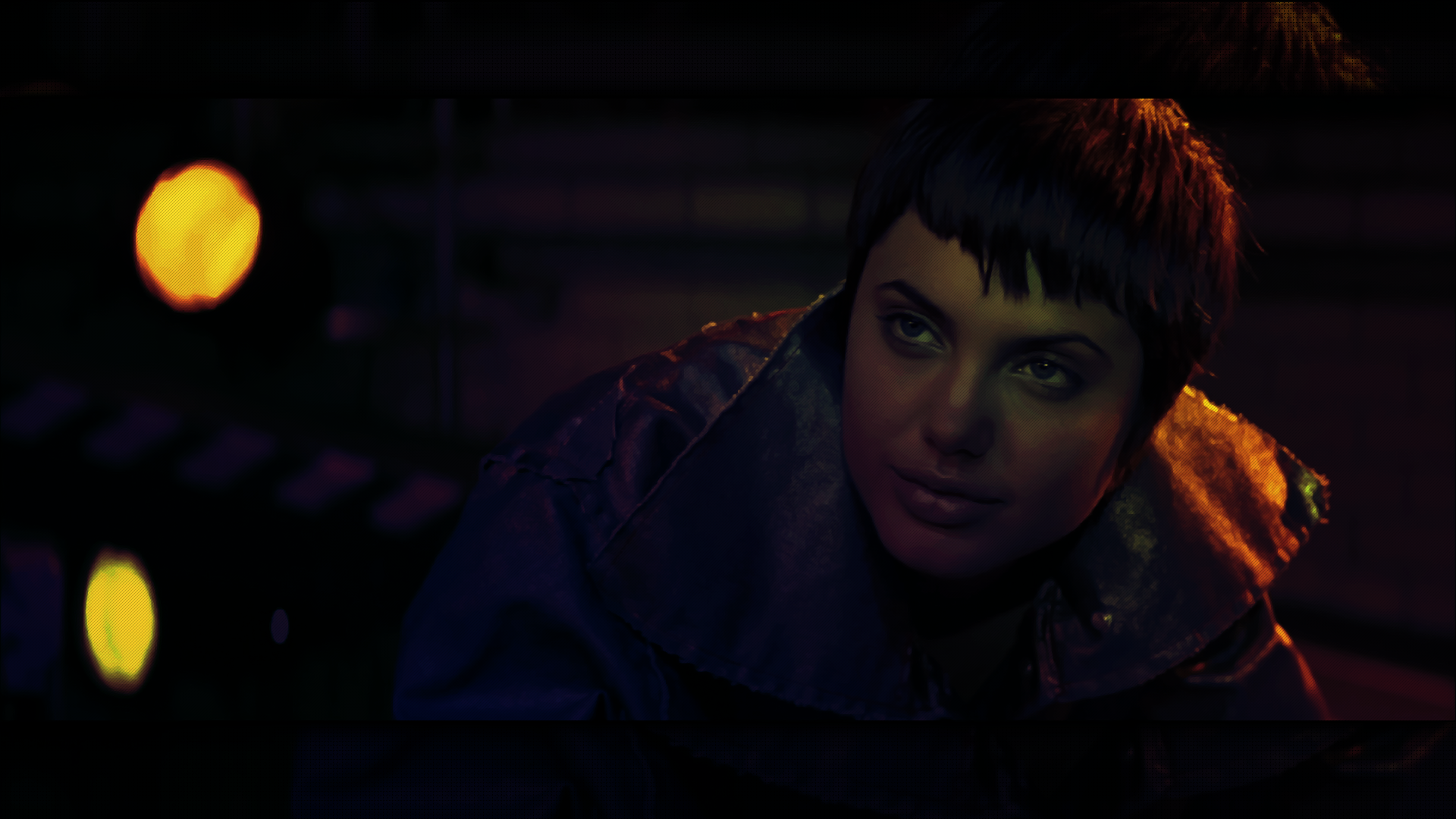 Angelina Jolie in a dark, neon-lit scene HD Wallpaper