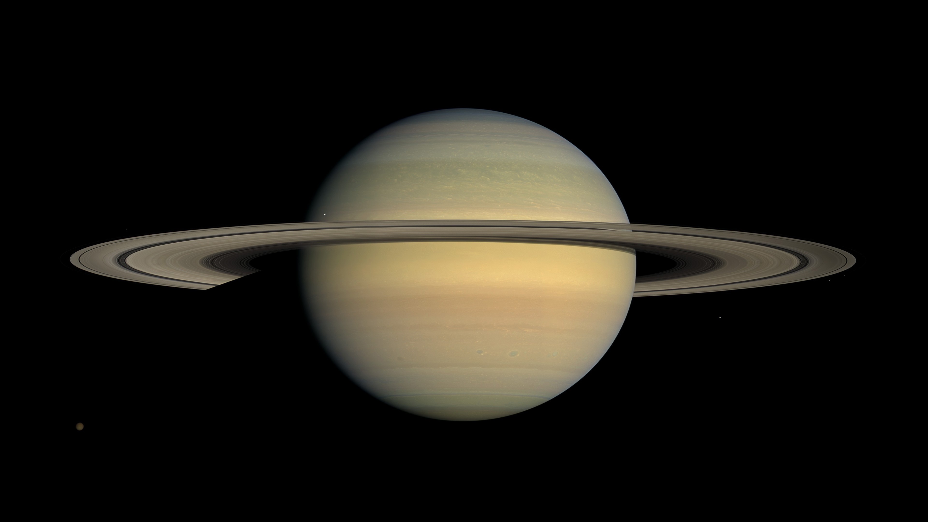 Saturn and its rings in space HD Wallpaper