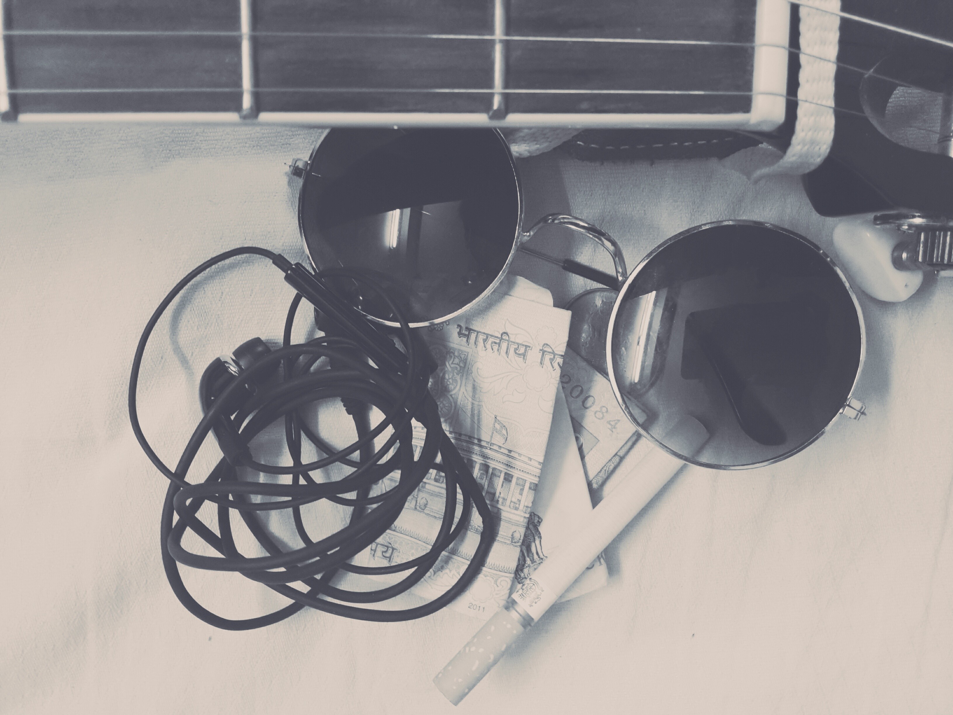 Guitar, sunglasses, headphones, and Indian currency HD Wallpaper