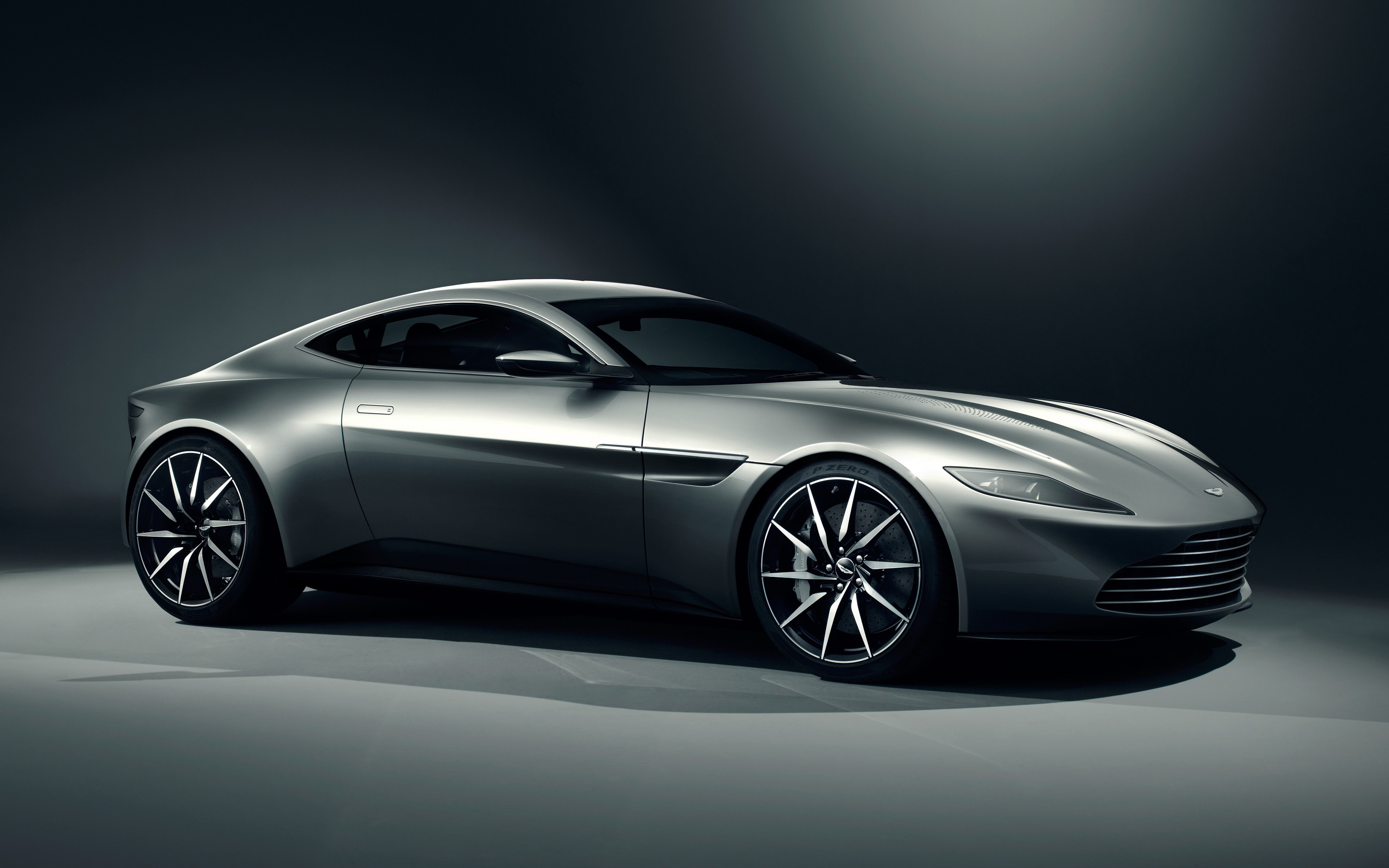 Silver Aston Martin DB10 sports car on a dark background HD Wallpaper