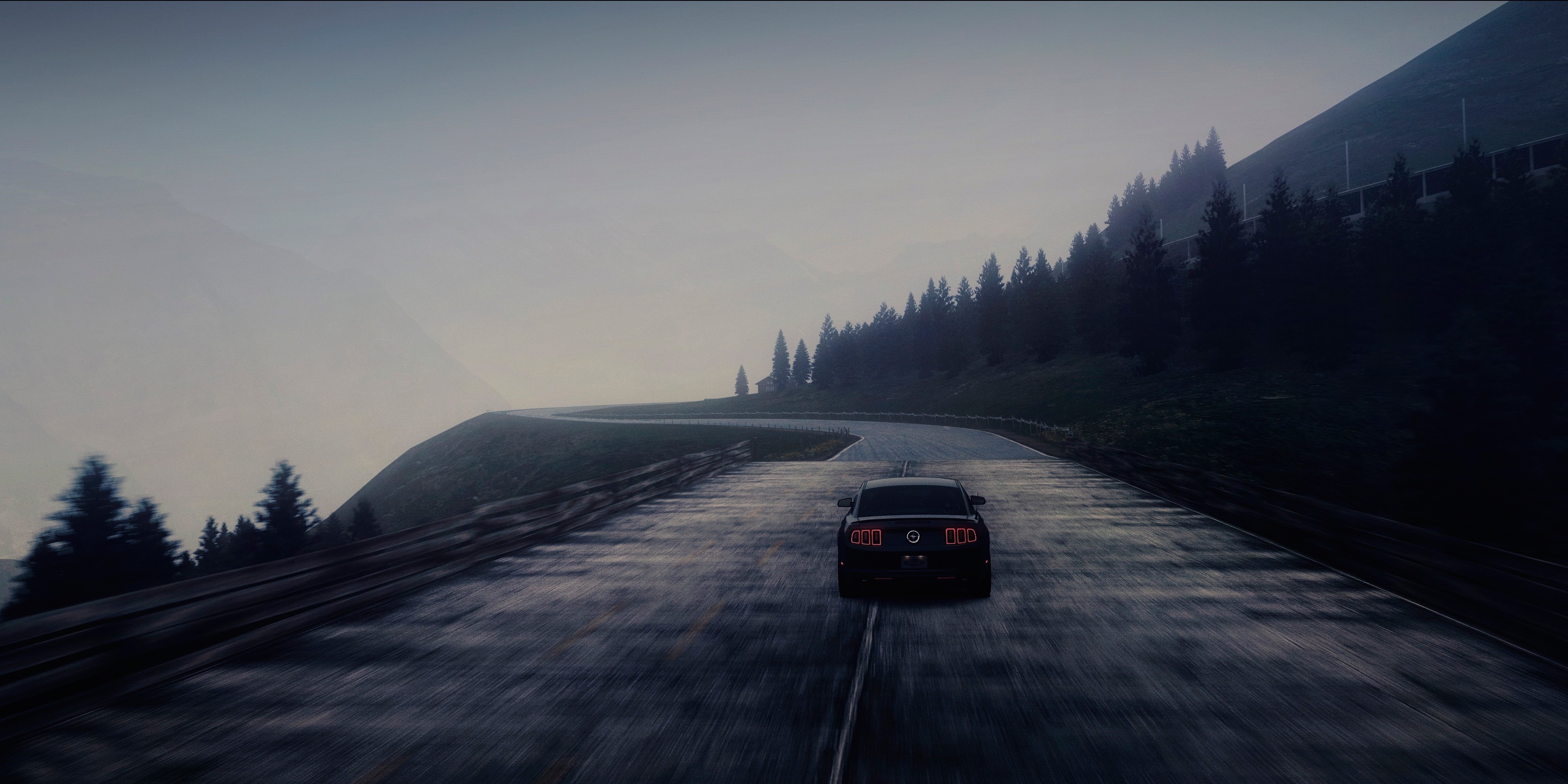 Black car driving on a foggy mountain road HD Wallpaper
