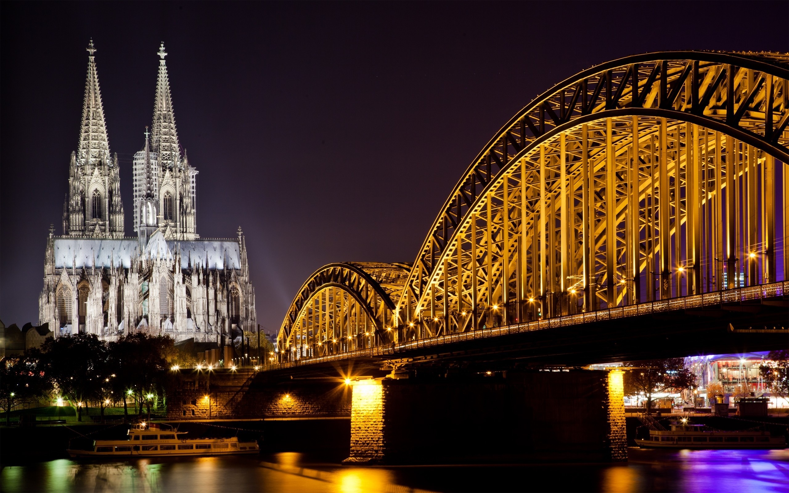 Cologne Cathedral and Hohenzollern Bridge at night HD Wallpaper