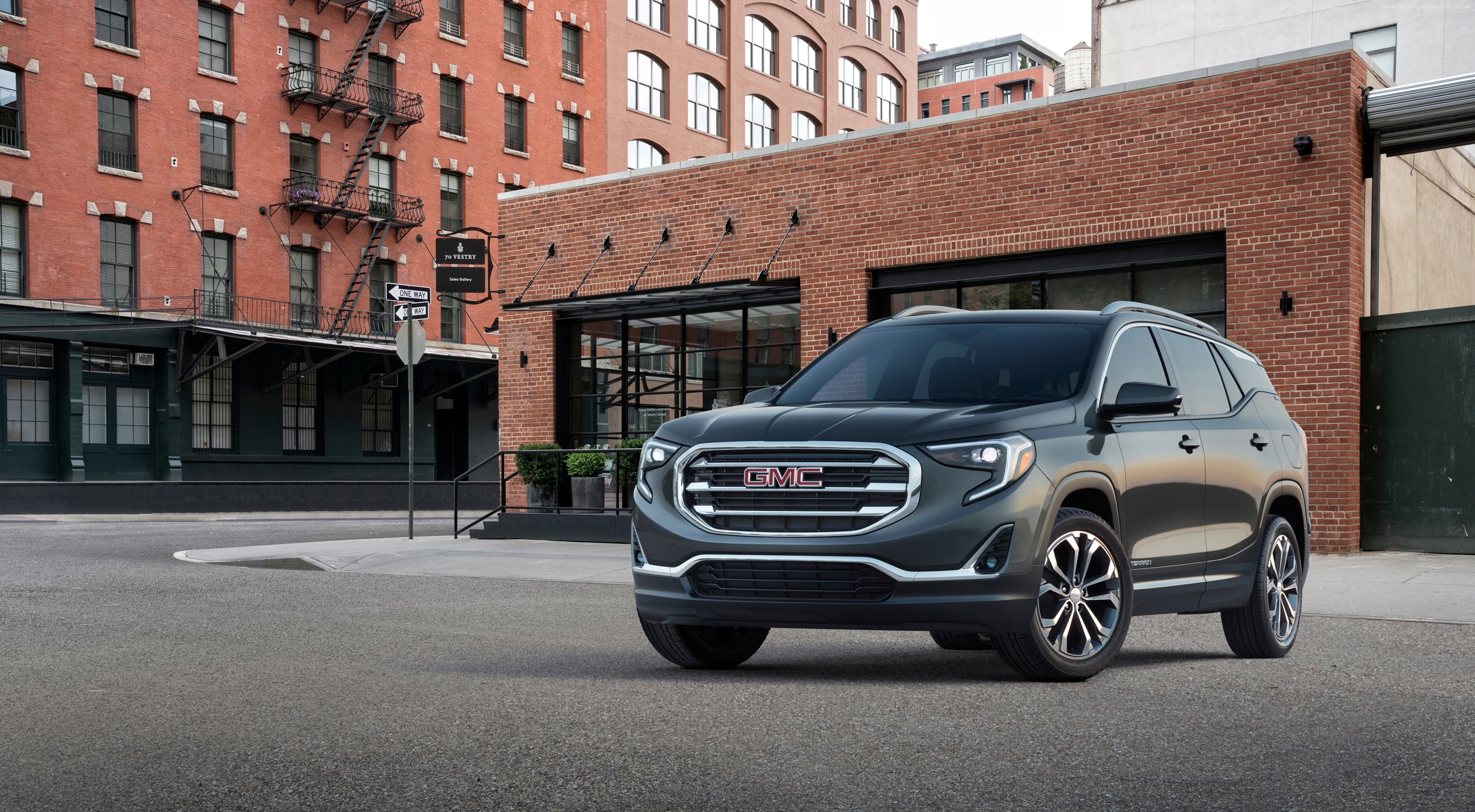 GMC Terrain SUV parked in an urban setting HD Wallpaper