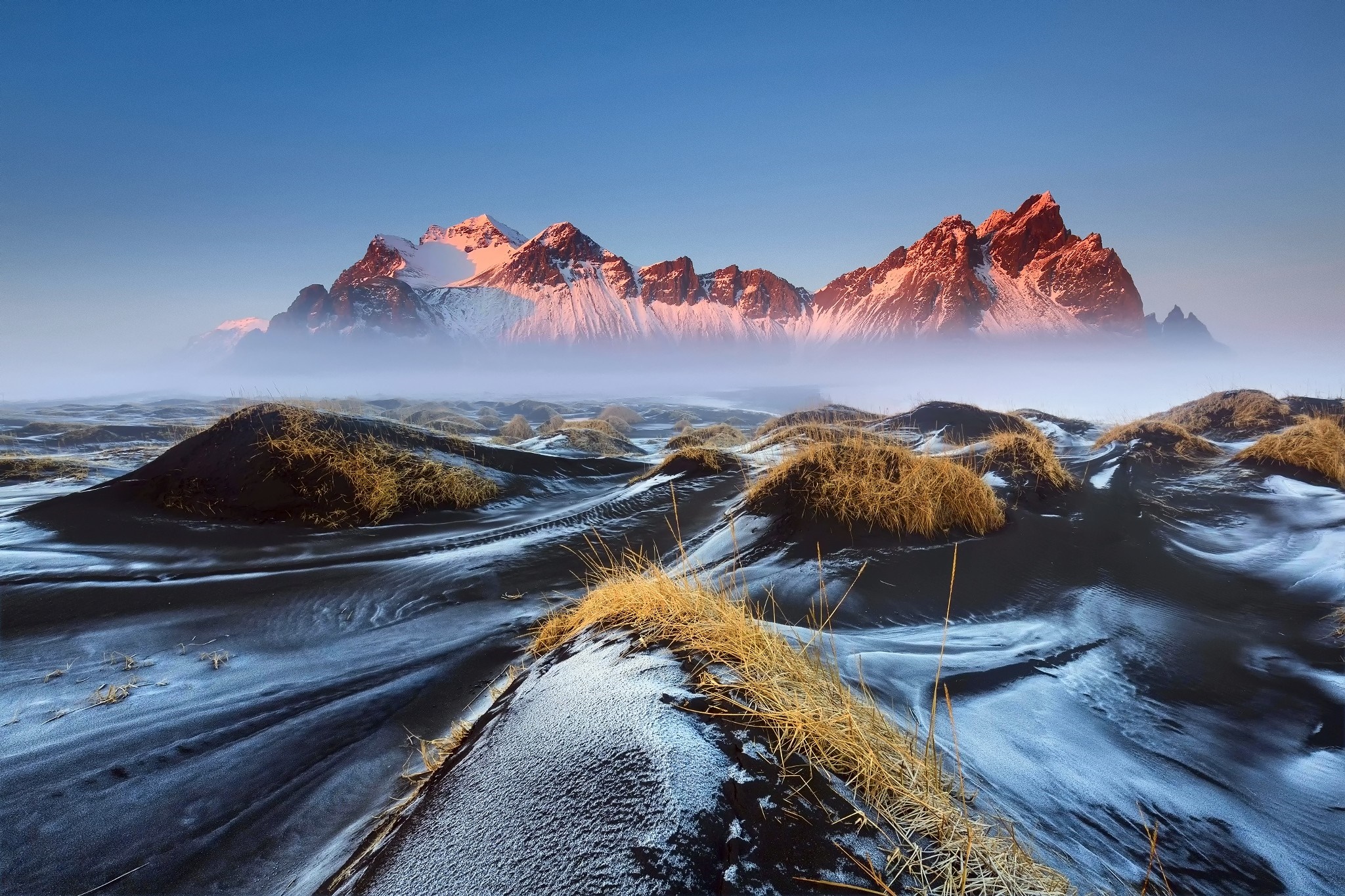 Snowy Mountains and Black Sand Dunes at Sunrise HD Wallpaper