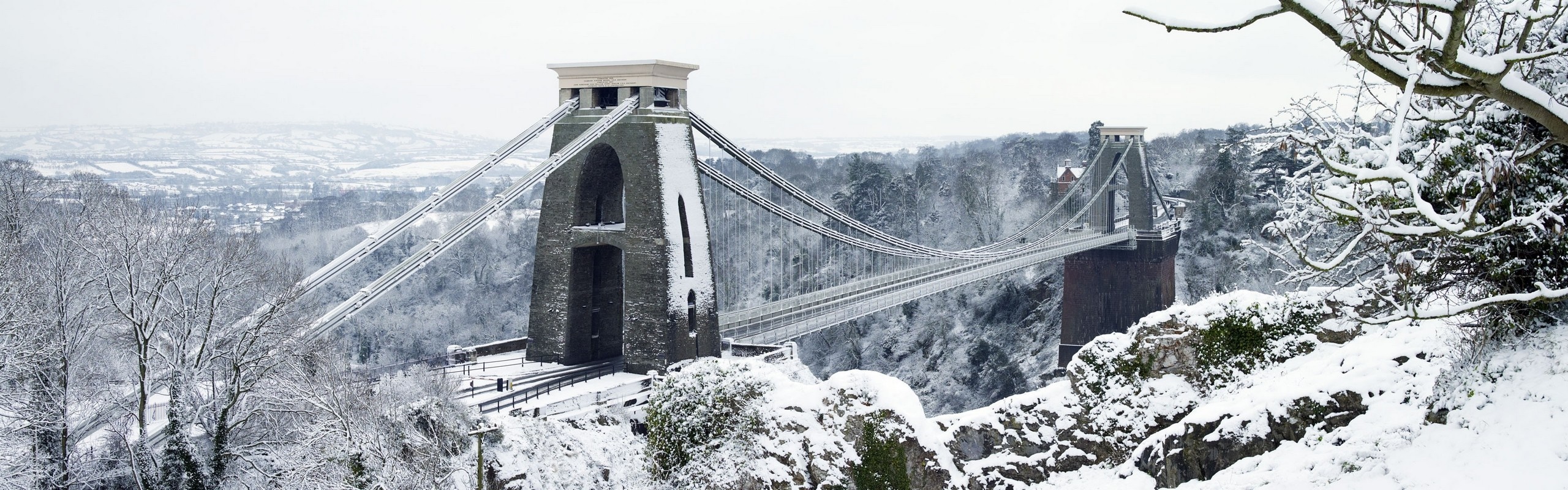 Clifton Suspension Bridge in Bristol during winter snow HD Wallpaper