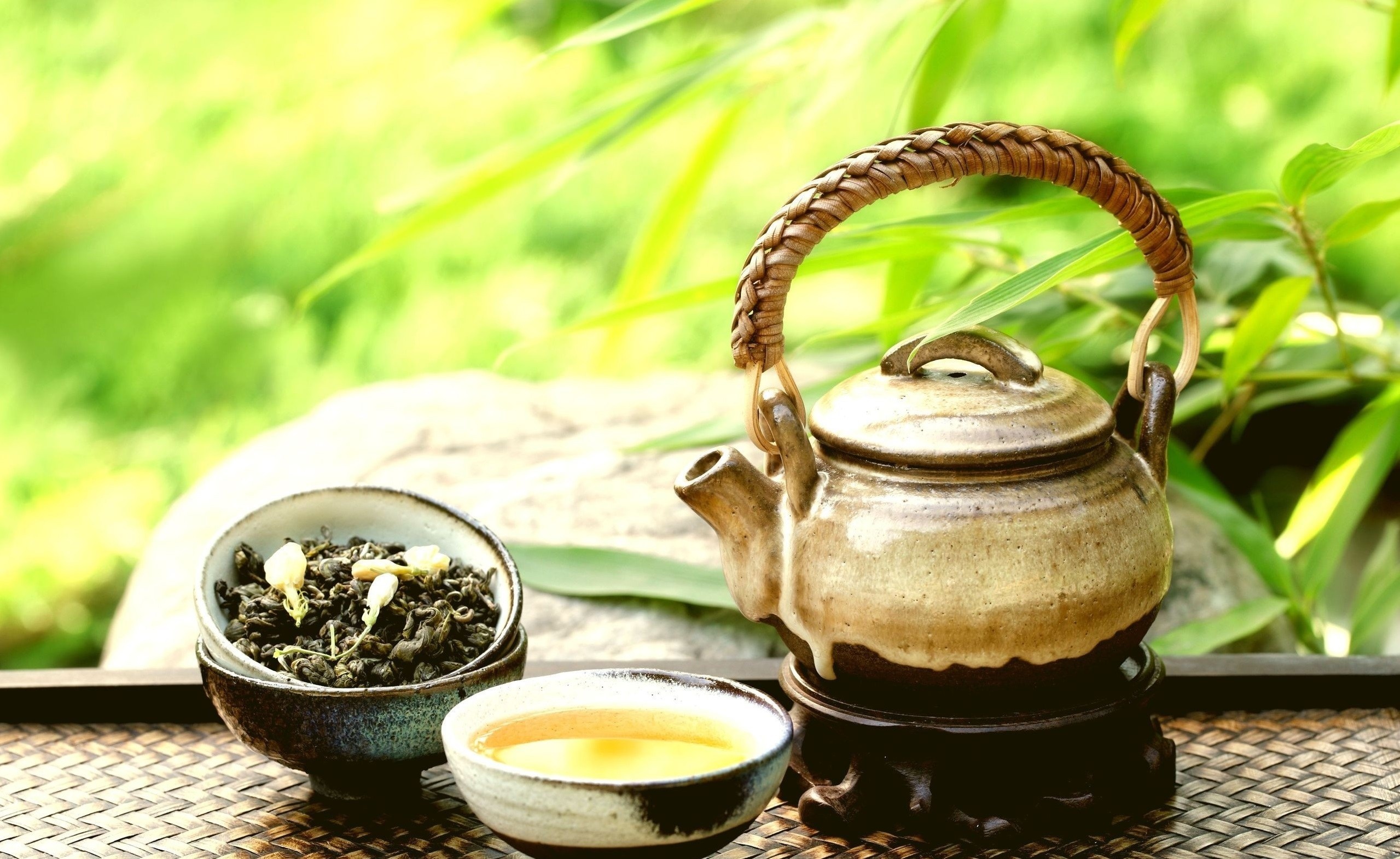 Tea ceremony with teapot and tea leaves HD Wallpaper