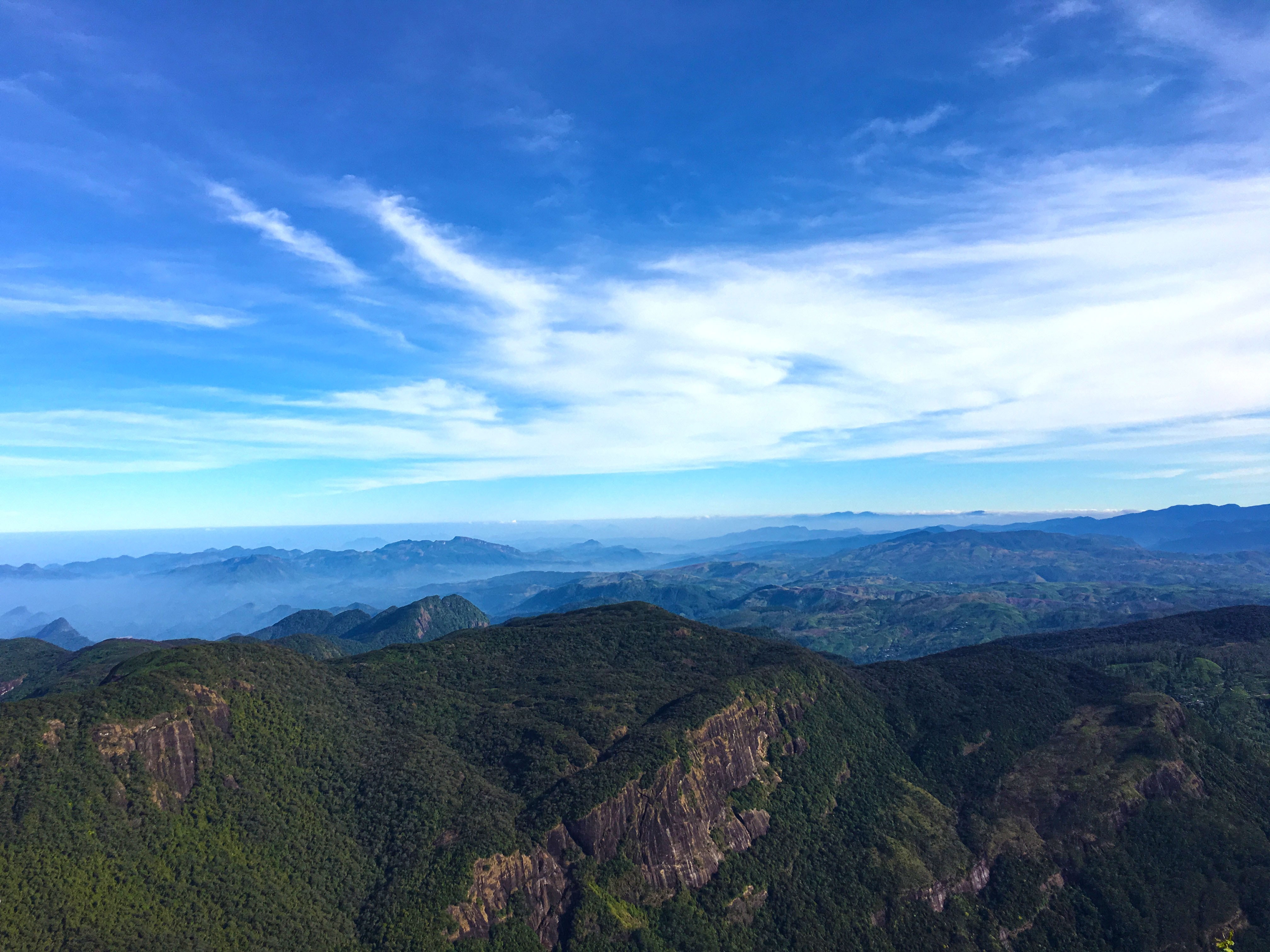 Mountain range with blue sky and clouds in Sri Lanka HD Wallpaper
