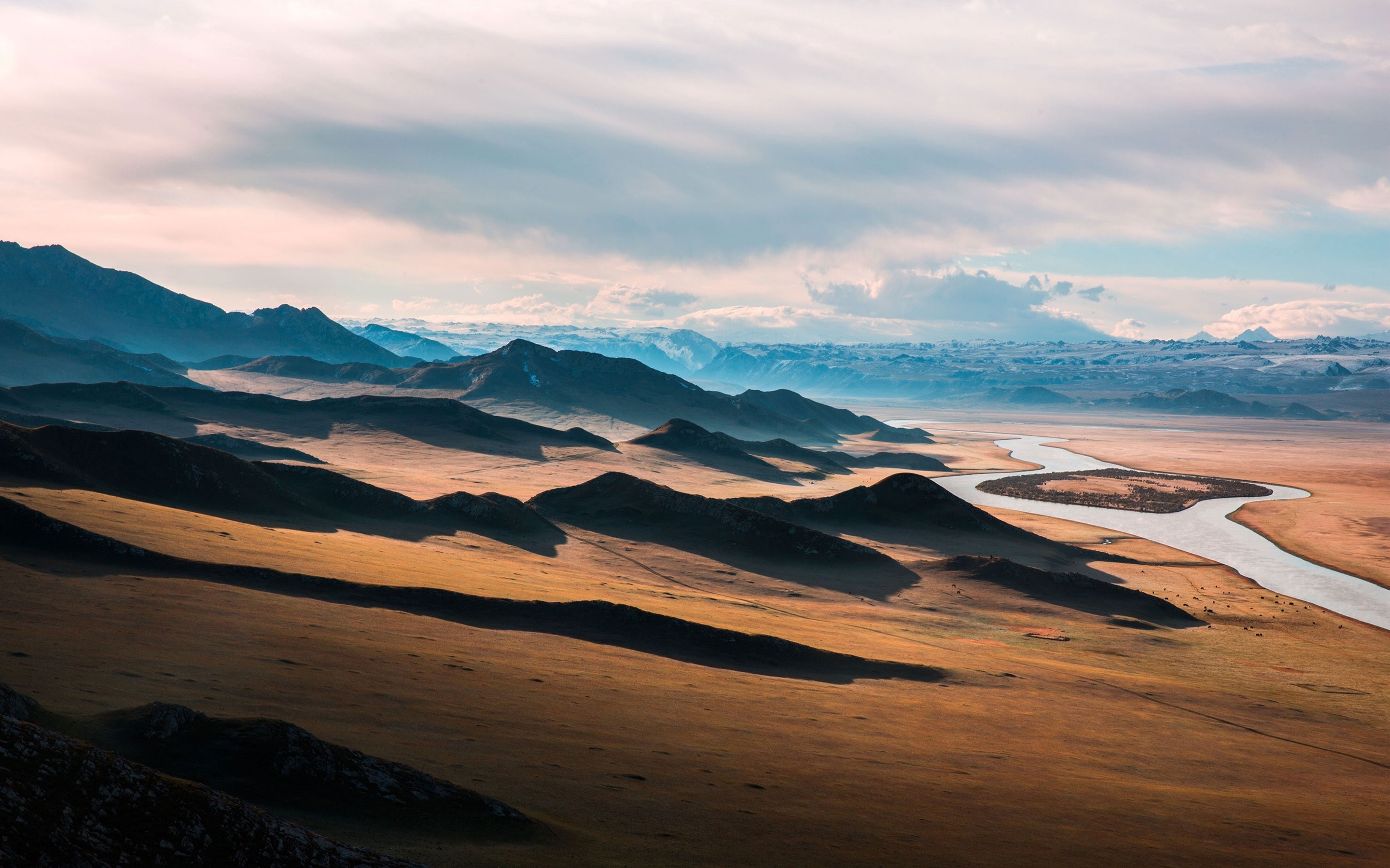 Mountainous landscape with a winding river at sunset HD Wallpaper