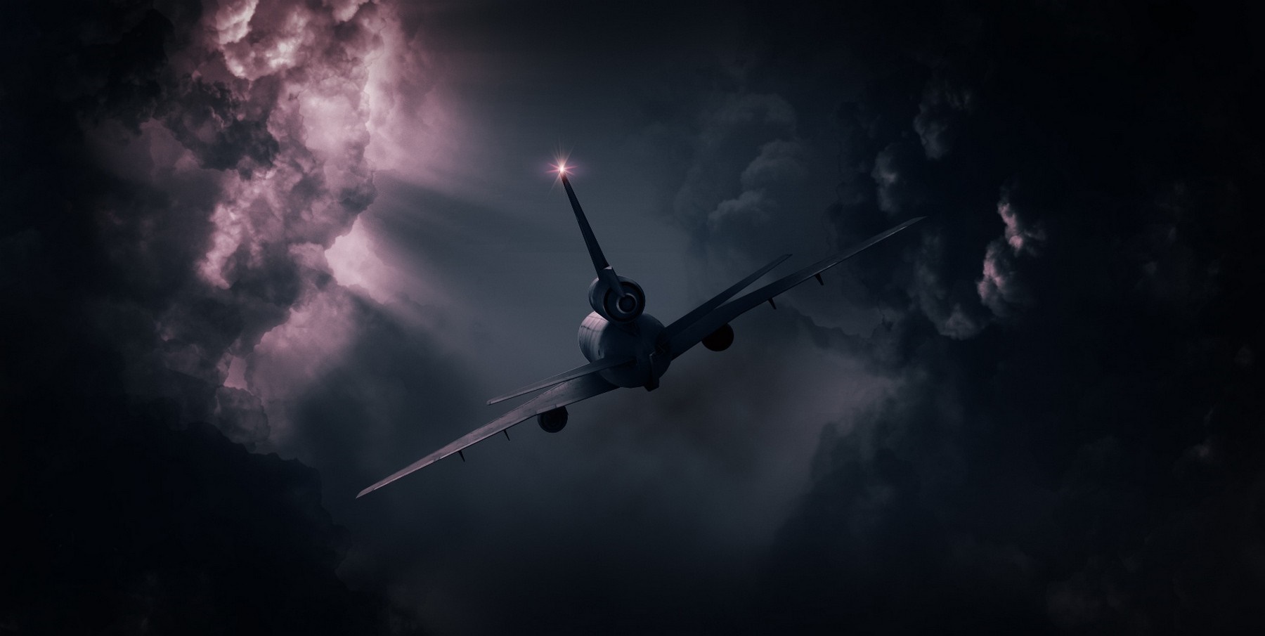 Airplane flying through dark stormy clouds with sun rays HD Wallpaper