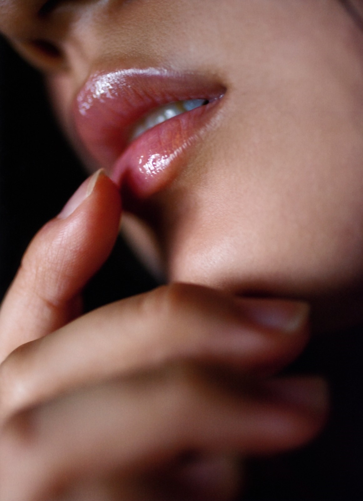 Close-Up of a Person's Lips and Hand HD Wallpaper