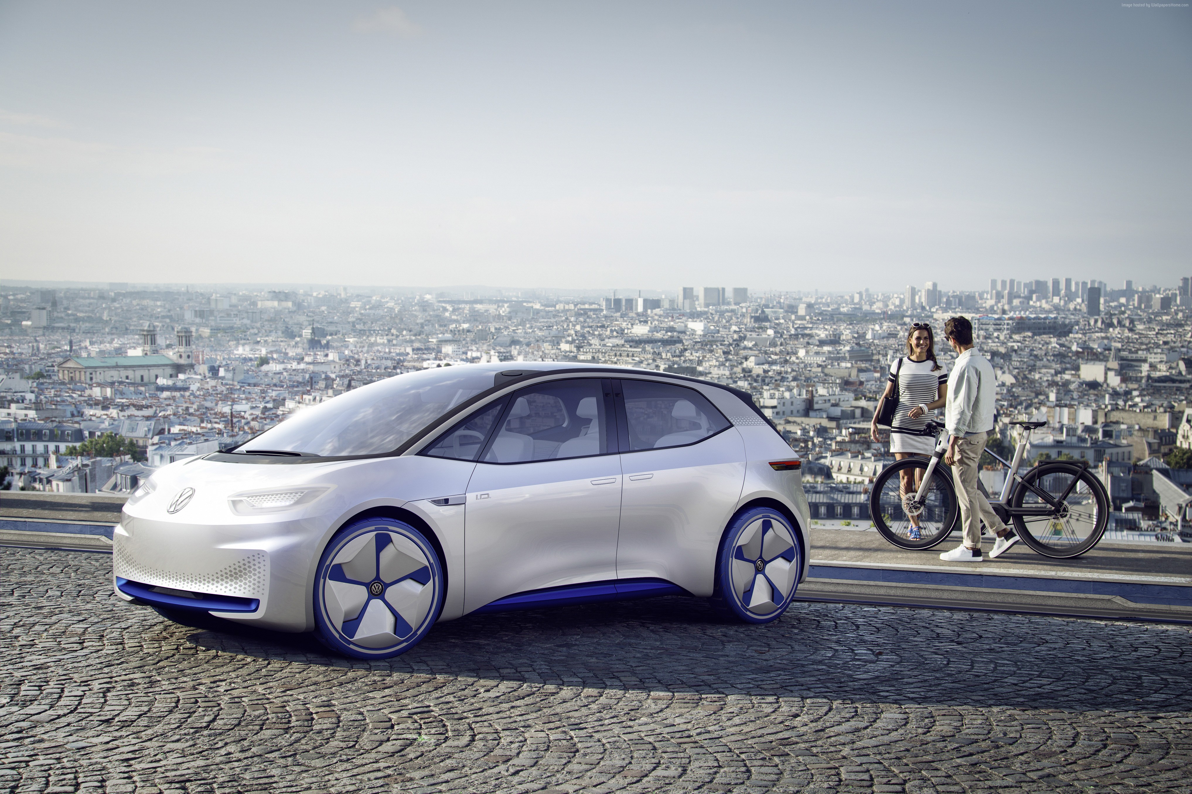 Volkswagen I.D. concept car with couple and bicycles in Paris HD Wallpaper